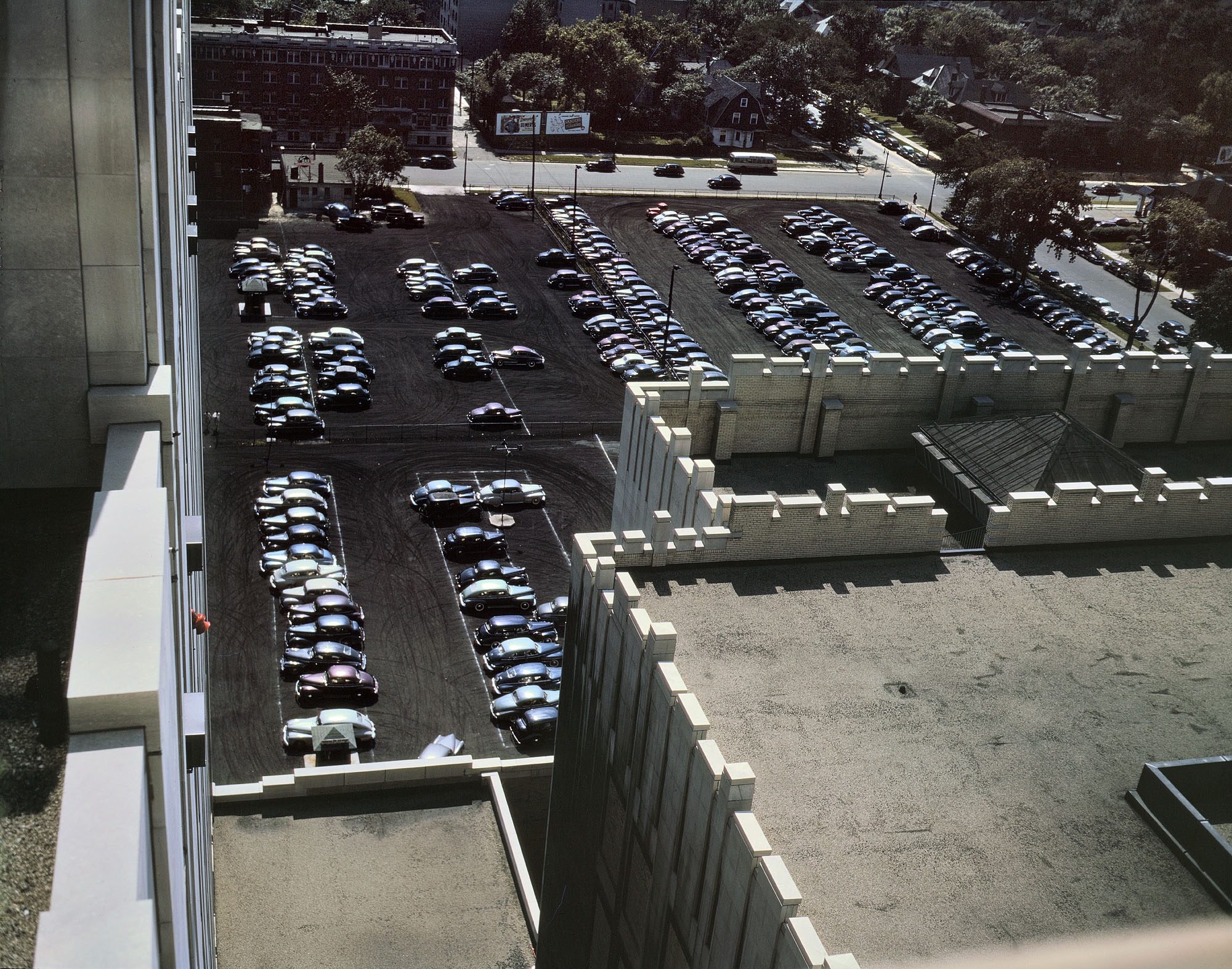 Detroit, July 1942. "Looking down on a parking lot from the rear of the Fisher Building." 4x5 Kodachrome transparency by Arthur Siegel. View full size.