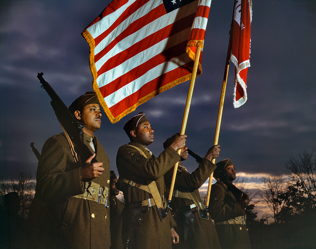 Engineers' color guard at Fort Belvoir, Virginia. March 1943. View full size. 4x5 Kodachrome transparency, photographer unknown.