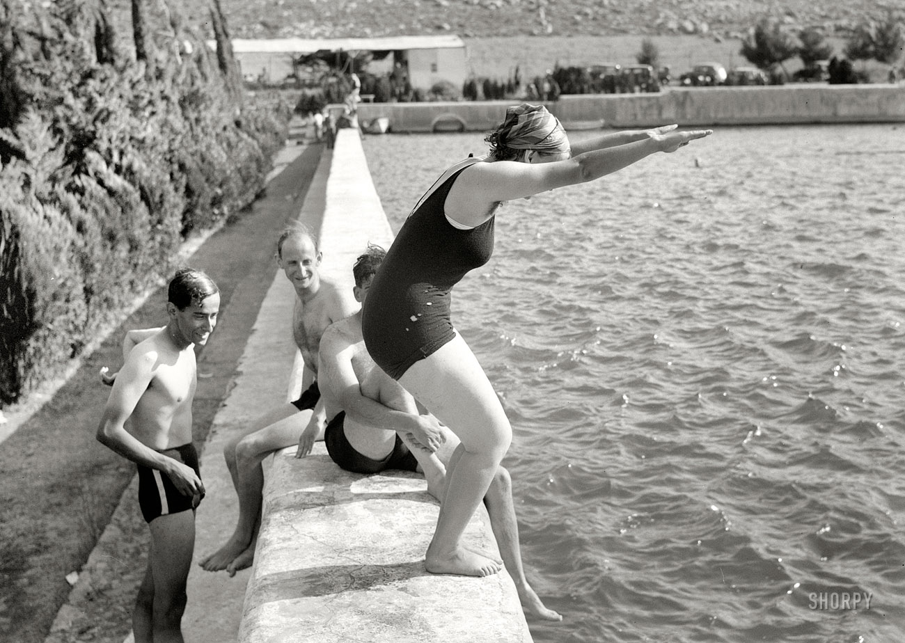 British Mandate Palestine circa 1940. "Solomon's Pools becomes a picnic & swimming resort. Taking a dive into the deep water of the upper pool." Another glimpse of the young lady seen here sans moth holes. Nitrate negative by the American Colony Photo Department/Matson Photo Service. View full size.
