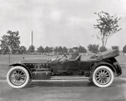 Washington, D.C. "Marmon Motor Car Co." I'll say circa 1915 and wait for the experts to weigh in. Harris &amp; Ewing Collection glass negative. View full size. [The consensus seems to be that this is a 1914 Marmon "48" seven-passenger touring car, which listed for $5,000 -- a staggering sum in those days. It's riding on 37-inch Firestone "Quick Detachable" natural-rubber tires.]
That new car smellI noticed that the tread on the tires is still white. Was this car just plunked down here? I also noticed a few other things; The bolt pattern on the front and back tires isn't the same. I guess you were expected to actually change the rubber on the rim? And a question: What is the cover for the folding top made of...vinyl? Did they have vinyl back then?
[Car tires used to be white, which is the color of natural rubber. Later the manufacturers started adding carbon black. The top would be canvas. The part showing in this photo is the "boot" that covers the top when it's folded. This one looks like rubberized canvas. - Dave]
My boss&#039; guessAnd he's been a car guy for 50+ years. Probably a 1913-1914.
[That's a good start. Now where are the people with multiple Marmons out in the garage? - Dave]
Not Dopey or Sneezy, he&#039;s GrumpyGiven the beauty and elegance of the new car this gentleman is piloting, one wonders why the fellow looks so very grumpy.
Big, BigIt is apparent the driver is a sizable man, but he looks small in the car. Some of those old giants were proportioned so well their size is misleading, but that is one BIG automobile!
[If you blow this up all the way you can read the tire size on the sidewall -- 37x5. Which means 37-inch wheels. - Dave]
WheelsThe car shown has demountable rims. The six bolts on the outer periphery of the wheel held the rim and tire assembly to the wheel. You jacked the car up, removed the bolts, pulled the rim off of the wheel and replaced it with the spare. The wood spokes were attached to an inner rim called a felloe. Most cars had this type of wheel until wire wheels became popular.
[I think these wooden artillery-style wheels were gradually supplanted by pressed steel discs. - Dave]
1914 Marmon &quot;48&quot;
[The "48" cost an eye-popping $5,000 in 1914. Below, some ads for the smaller "41." - Dave]

Hains Point CruiserThis may be what is now Ohio Drive on Hains Point, an almond-shaped spit of land in the Potomac immediately south of Washington's innermost downtown area.  Our subject would be facing northwest, directly under what would become the southbound final approach to Reagan National Airport.
[Look at the shadows. The sun is shining more or less from the south. - Dave]
37s Dawg!&hellip; 
Front brakesI do not see a brake drum on the front wheel. Wonder when front brakes became standard equipment?
Pricey to say the least$5,000 in 1914 is $108,690 in 2009 dollars. Model T Fords were quite a bit less.
Non-skids...And the tires are the famous Firestone "Non Skid" tires, with the words NON and SKID making up the tread.  These have been available as reproductions since at least the 1970s (the first time I saw some in person).  Coker Tire makes them, but only in black.
Look at those wheels!Those make the 22 inch wheels on an Escalade look like they belong on a trike!
What a beautiful vehicle.
The Boot Coveris probably Fabrikoid pyroxylin-coated canvas manufactured by a subsidiary of Dupont up in Newburgh NY back in those days. Pyroxylin was a form of polymerized cellulose, and Fabrikoid was a Dupont trademark after 1910. Other forms were used for many years in artificial leather applications such as as auto seat covers, general upholstery, bookbinding and as window shades. DuPont gradually replaced the pyroxylin cellulose component with synthetic polyvinyl chloride (vinyl). Or as Dupont called it, Fabrilite.
My dad was for many years the overseas sales liaison for these types of goods for Dupont for some 40 years until he retired in Delaware in 1966.
Parallel parkingIn 1964 I managed to flunk the parallel parking portion of my drivers test in a 62 Dodge Dart (took out some cones). I could've really done some damage trying to park that monster.
Early Tire SizesTires were sized differently back then. A 37x5 tire is 37 inches outside diameter with five-inch sidewalls. It fit a 27-inch rim. The transition from wooden wheels to the pressed steel wheels was not the same for all manufacturers. Ford, Chevrolet and many others used wire wheels before the transition to the steel wheel. Of course most failed during the Depression and died with their wooden boots on.
Four-wheel brakesBrakes on every wheel were a late 1920's innovation, long after this car was made. Early on, four-wheel brakes were thought to be dangerous. This Marmon may have had a brake on the drive shaft behind the transmission, in addition  to the rear-wheel brakes.  
Nevertheless, one had to anticipate well in advance to stop one of these massive autos, often applying both brakes at once. The rear brakes would have been pedal-operated, the driveshaft brake would have been a pull lever, like a modern parking brake.
InflationI own a 2-flat brick apartment building in Chicago which was built in 1914. It sold for just over $5,000 new. If it's ever torn down I'm required to replace it with a building that will sell for a minimum of $5,000, not much of a problem nowadays!
(The Gallery, Cars, Trucks, Buses, D.C., Harris + Ewing)
