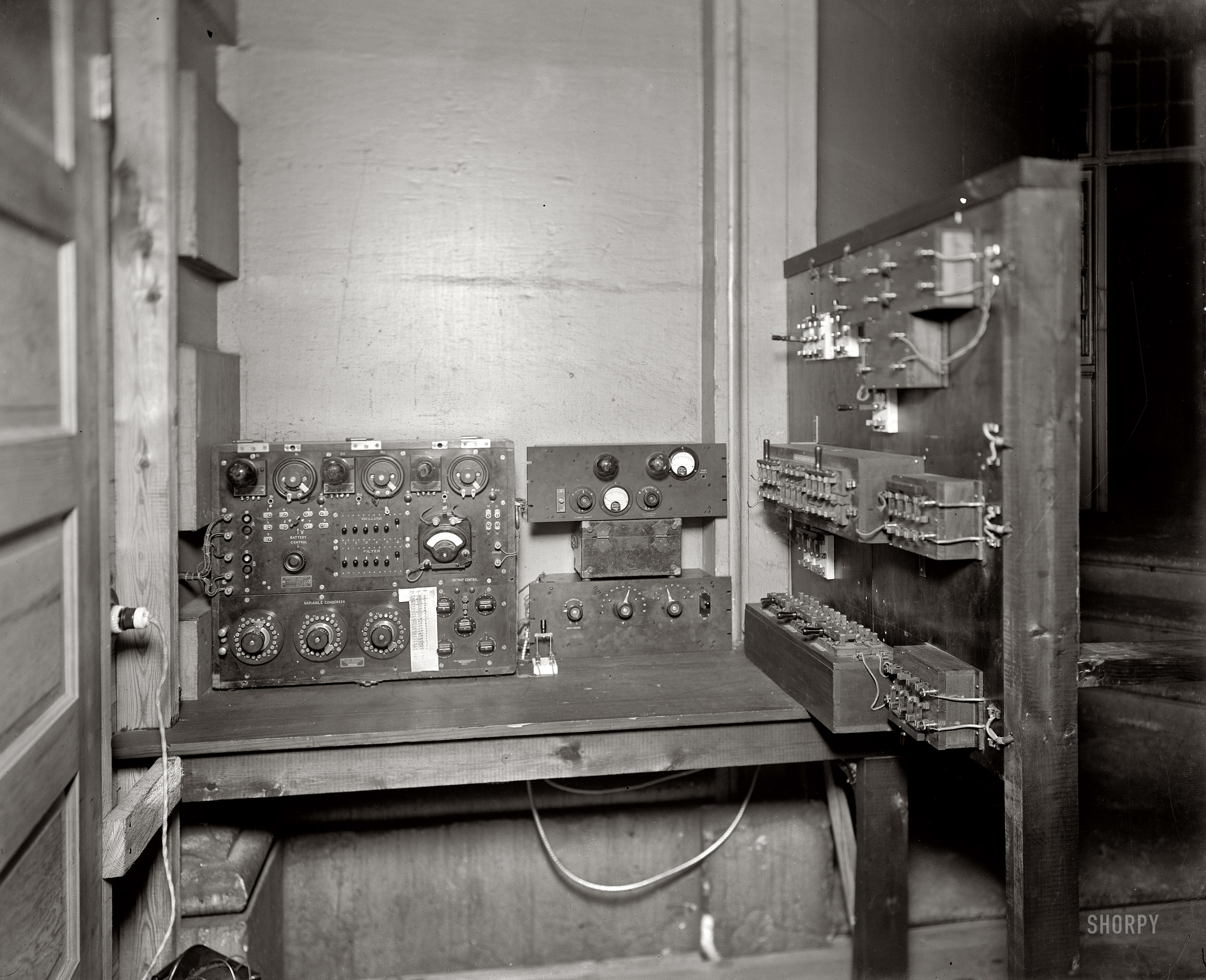 Washington, D.C., circa 1919. "Chesapeake & Potomac Telephone Co. equipment."  More communications gear at what seems to be the Capitol. The box on the left bears the nameplates of Leeds & Northrup, Philadelphia, and Western Electric. Harris & Ewing Collection glass negative. View full size | The knobs.