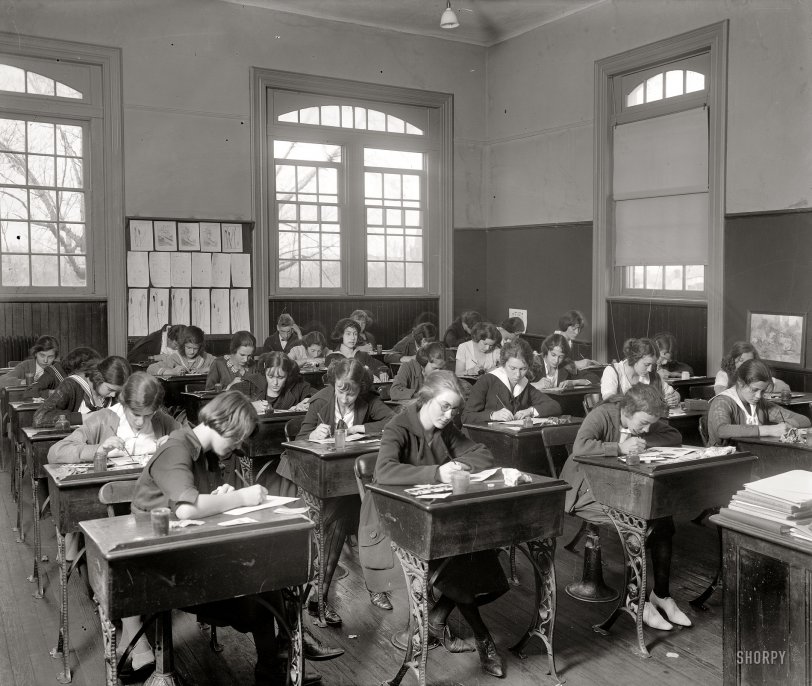 "Junior high school classroom." With one lucky (?) boy in the back. In or around Washington, D.C., circa 1921. Harris &amp; Ewing glass negative. View full size.
