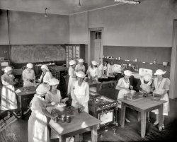 Washington, D.C., circa 1921. "Junior high school: Home Ec." Speaking as someone who needs to go lie down after microwaving a bag of broccoli, just looking at all this food preparation makes me dizzy with fatigue. View full size.