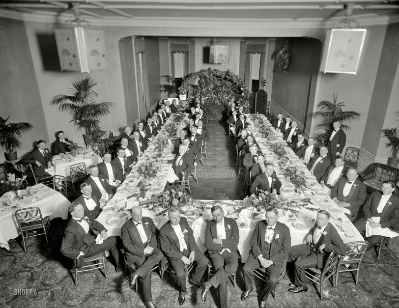 Washington, D.C., circa 1920. "Civitan Club." Caught in the middle of the soup course. Harris &amp; Ewing Collection glass negative. View full size.
