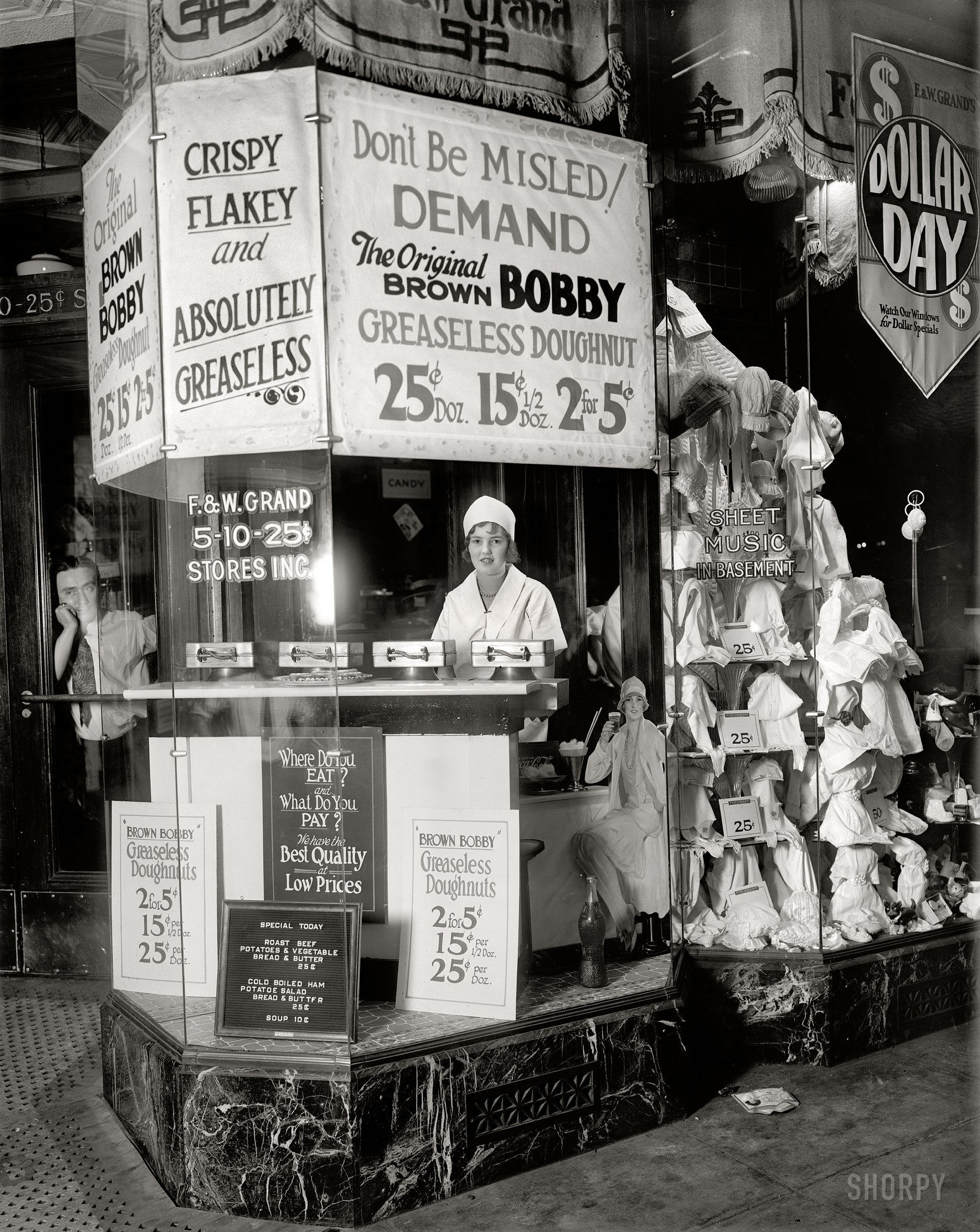 Washington, D.C., circa 1925. "F.W. Grand store." So, the greaseless donut: Boon or abomination? Harris & Ewing Collection glass negative. View full size.