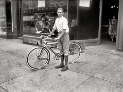 Washington, D.C., circa 1921. "Times boy and bicycle." One of the winners of a Washington Times subscription-selling contest and his prize, a Mead Ranger bike. More here and here. National Photo glass negative. View full size.