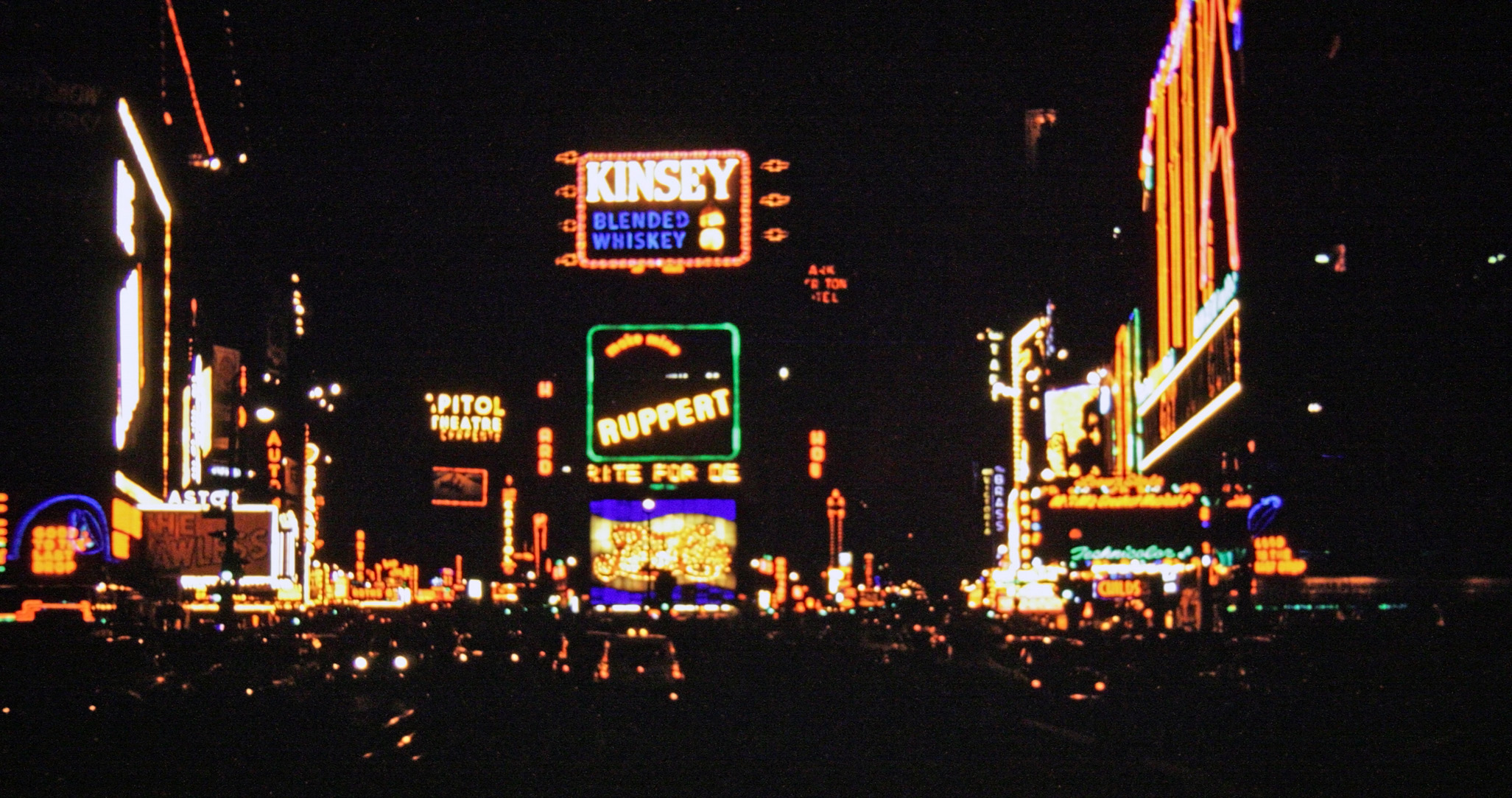 My brother carried his trusty Argus C3 with him on his trip home from Puerto Rico sometime in 1950. They say the neon lights are bright on Broadway! View full size.