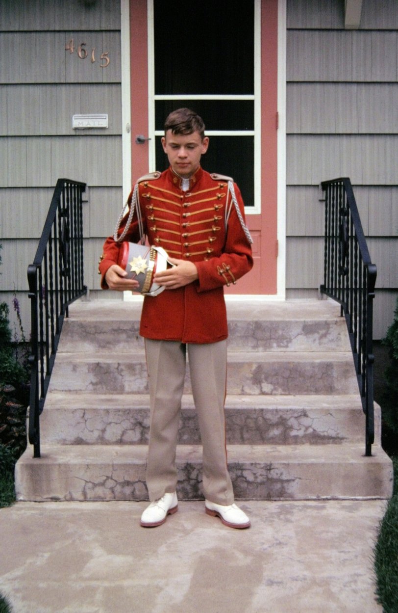 Proud member of the (award winning) Patrick Henry High School marching band. Minneapolis, 1962. Those wool uniforms were unbearable during summer parades. View full size.
