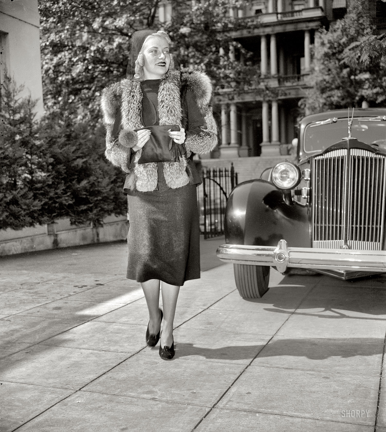 Washington, D.C., circa 1937. "Jane Grier." Pictured with a Packard near the old State, War and Navy building. Harris & Ewing Collection. View full size.
