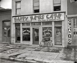 Washington, D.C., circa 1937. Exterior of the Happy News Cafe (described in a 1933 news item as "the new dietitian restaurant for the unemployed") at 1727 Seventh Street N.W. Harris & Ewing Collection glass negative. View full size.