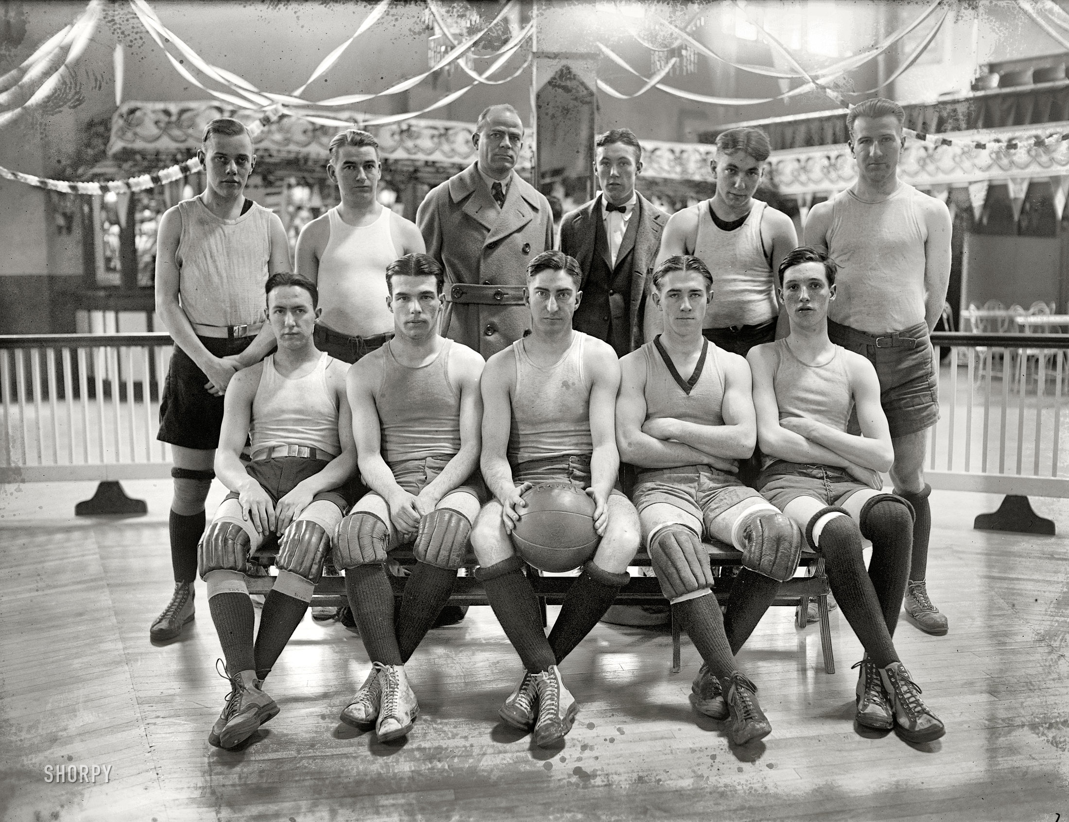 Washington, D.C., 1923. "Catholic University basketball team." An interesting array of affects here. National Photo Company glass negative. View full size.