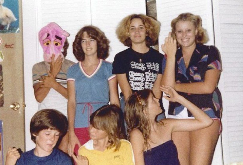 Here we all are, energy-ridden pre-teens, ganged up at a friend's house in the summer of 1979. Long before the days of CDs, cell phones and home computers, we had to create our own entertainment, usually holed up in a friend's bedroom playing board games or listening to records. Or, in this case, just being silly. Ahh, the good old days!  
