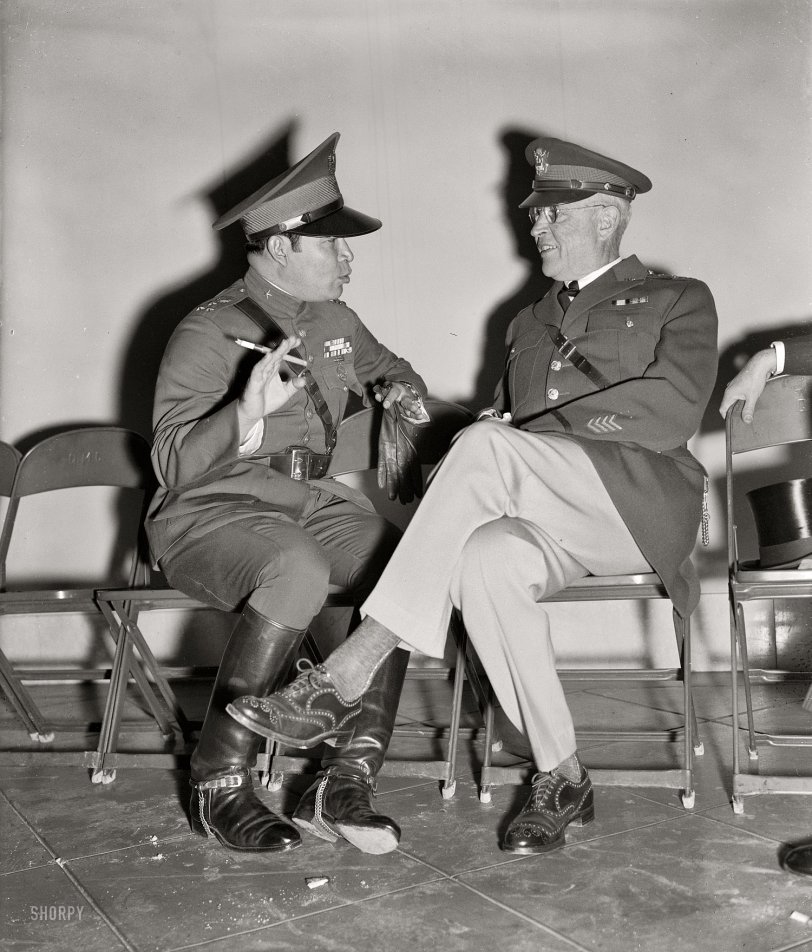 November 11, 1938. "No doubt armies were discussed when this picture was made today. Maj. General Malin Craig, U.S. Army Chief of Staff, and Col. Fulgencio Batista, Cuba's Dictator, as they chatted informally at Arlington while waiting for the arrival of President Roosevelt for the Armistice Day ceremonies there." Harris &amp; Ewing Collection glass negative. View full size.
