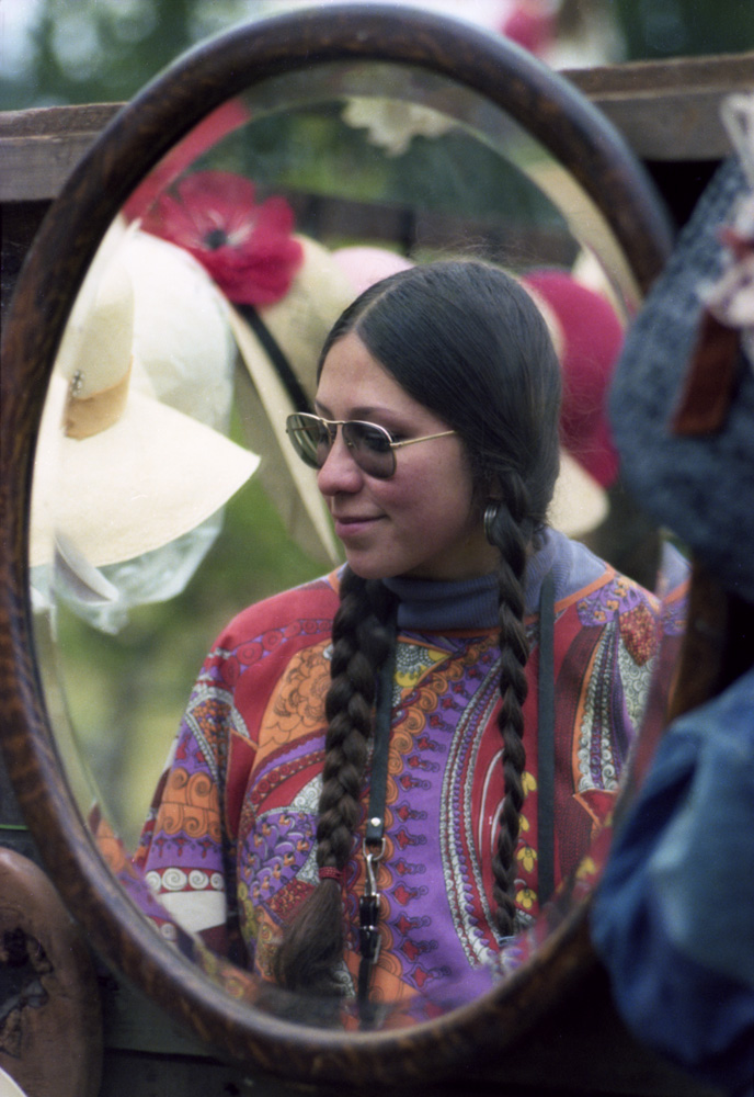 My sister-in-law reflected in a mirror at an art & crafts fair in Santa Cruz, California in 1974. I shot this on 35mm Kodacolor. View full size.