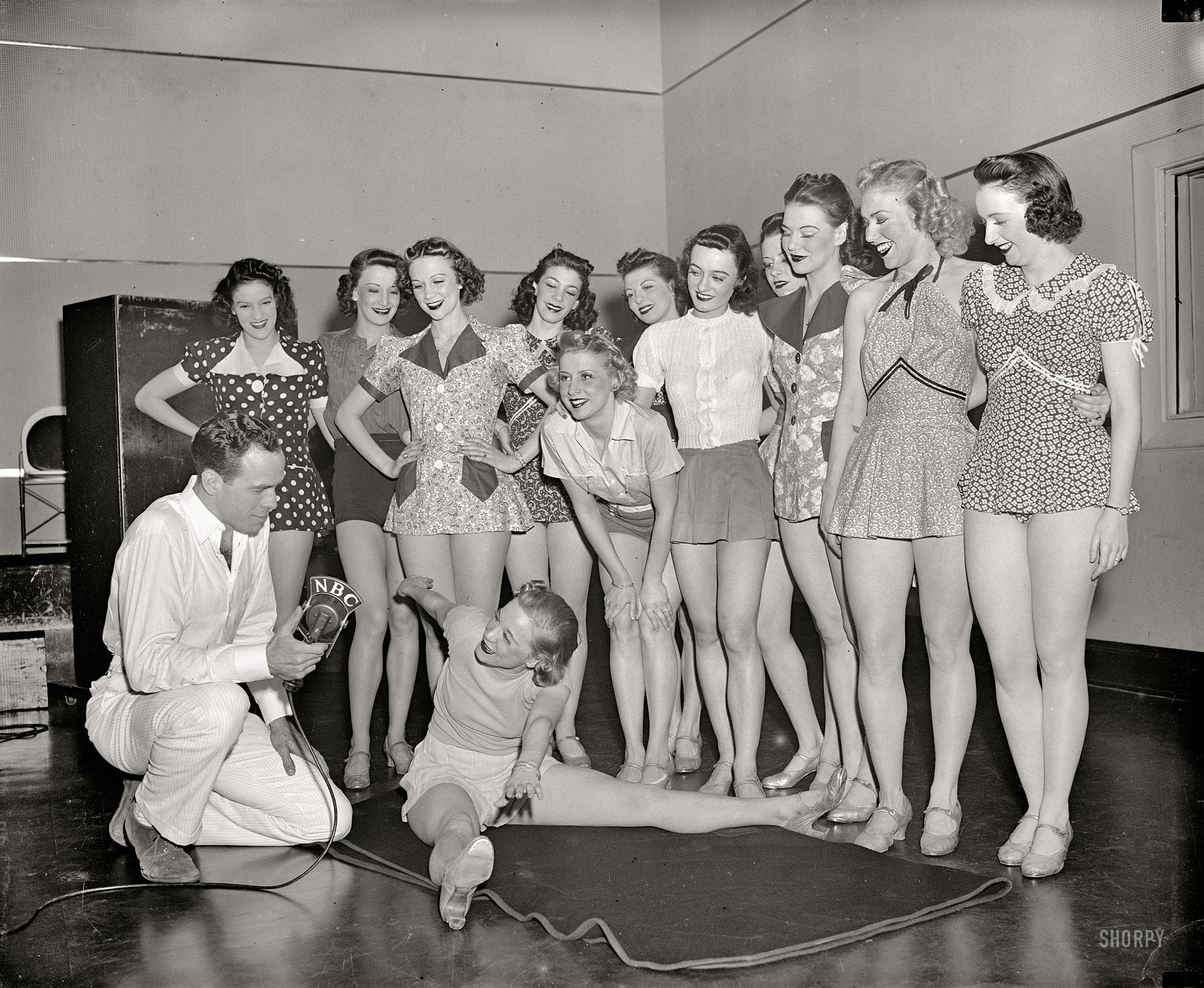 Washington, D.C., circa 1938. "Dancing class, WRC studio." Smile for the microphone, girls. Harris & Ewing Collection glass negative. View full size.