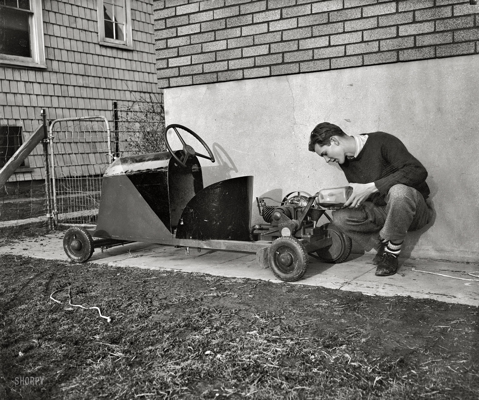 February 2, 1939. "Builds own Jalopy. Thirty dollars was all it cost Robert Preston, 16-year-old high school senior, to build this midget automobile. Weighing approximately 250 pounds, the 'jalopy' is powered with a washing machine motor of ¾ horsepower and has a maximum speed of 20 miles an hour. His license tags for this year will cost 32 cents." Harris & Ewing glass negative. View full size.