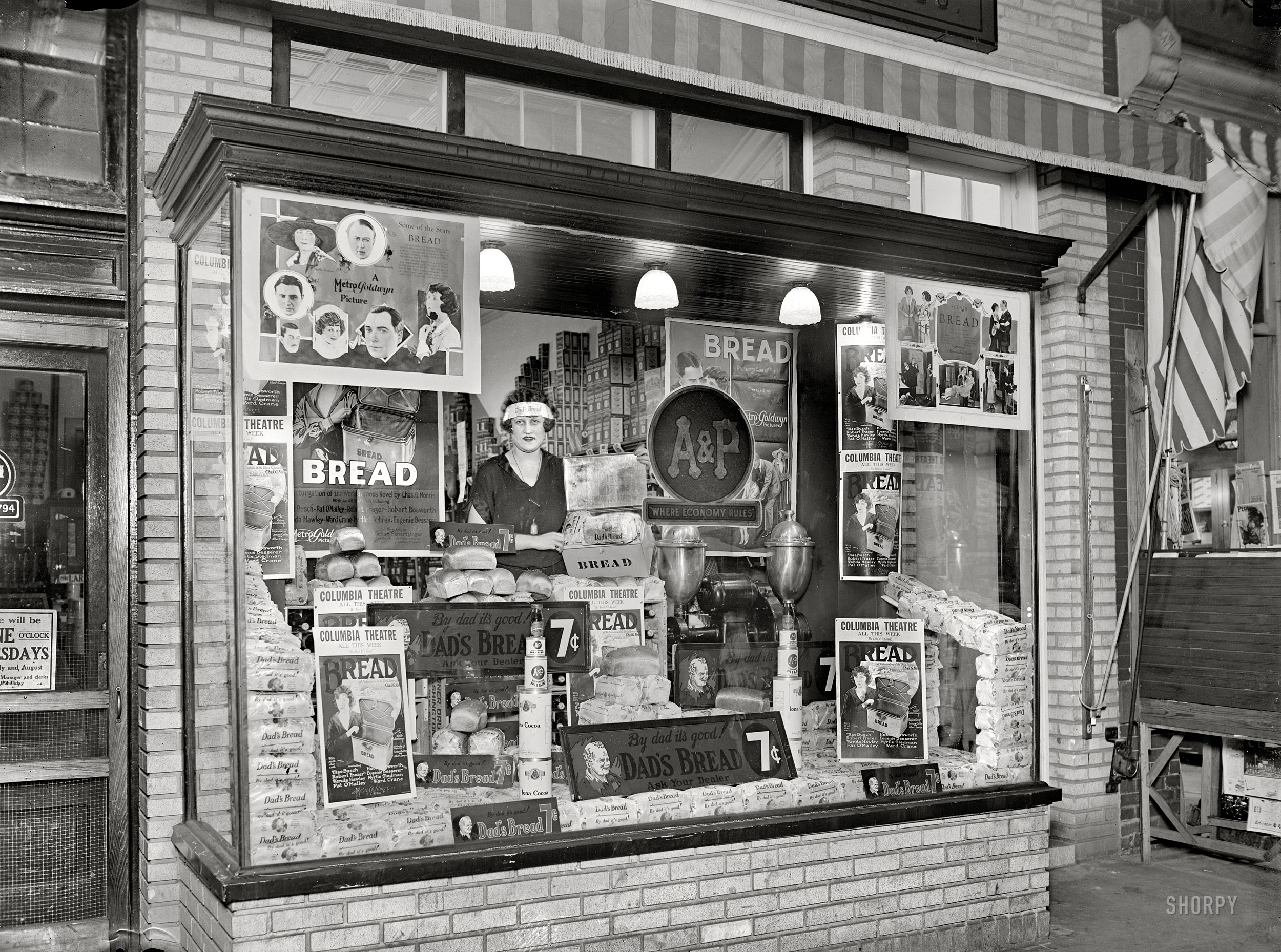 Washington, D.C., 1924. "A&P Stores, Miss Frances Talley."  Storefront spokesman for Dad's Bread and its rather literal marketing tie-in with a movie called "Bread." National Photo Company Collection glass negative. View full size.