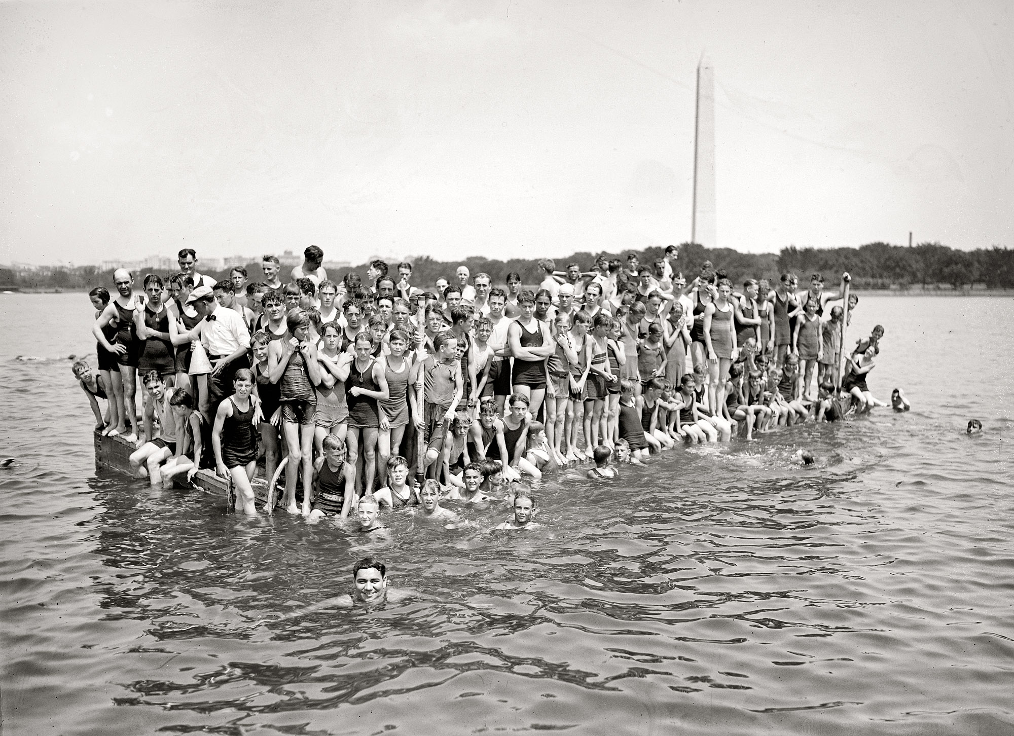 August 7, 1924. "Warren Kealoha, Hawaiian Olympic swimmer, at Tidal Basin." Warren, closest to the camera, won the gold in the men's 100-meter backstroke in 1920 and 1924. National Photo Company glass negative. View full size.