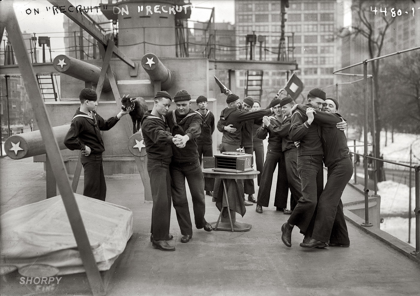 New York, 1917. "Aboard the Recruit." Our first glimpse of life on the "landship" U.S.S. Recruit, a wooden destroyer set up in Union Square as a Navy recruiting station. For our marooned sailors there was a phonograph, dancing and a pet goat. 5x7 glass negative, George Grantham Bain Collection. View full size.