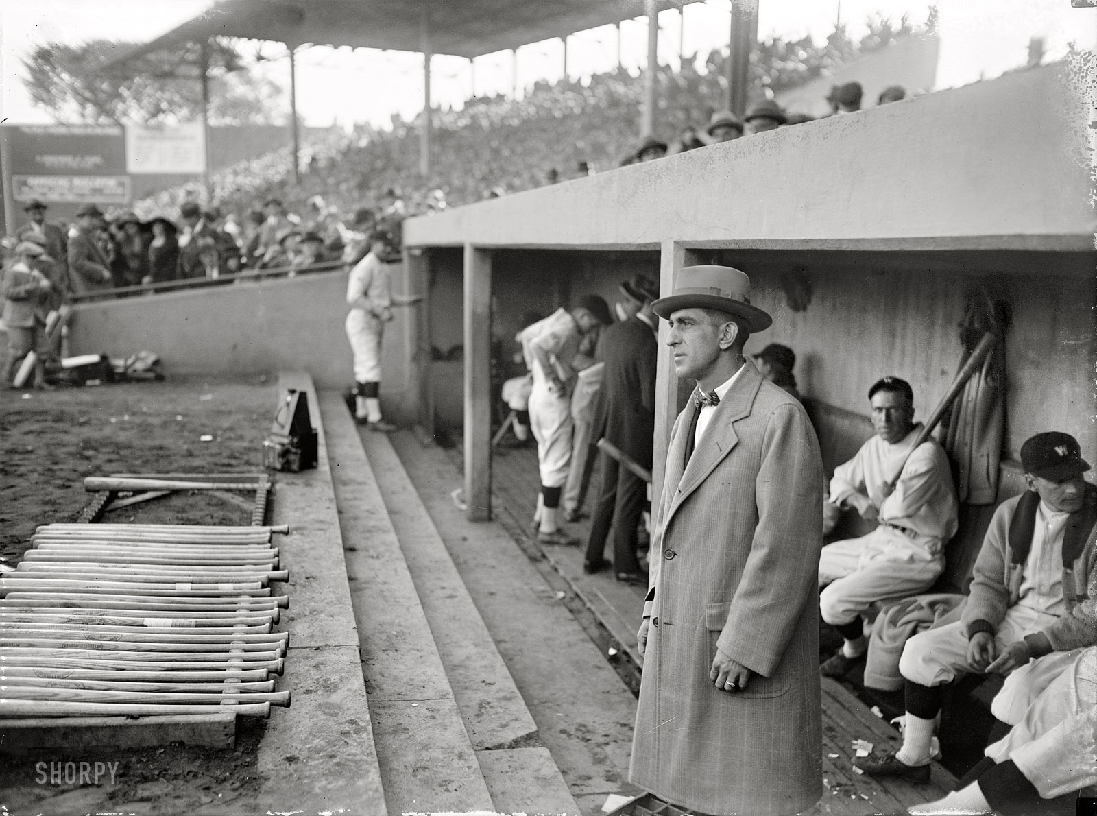 October 10, 1924. Griffith Stadium in Washington, D.C. "Peckinpaugh sees final World Series game from dugout on account of injuries." View full size.