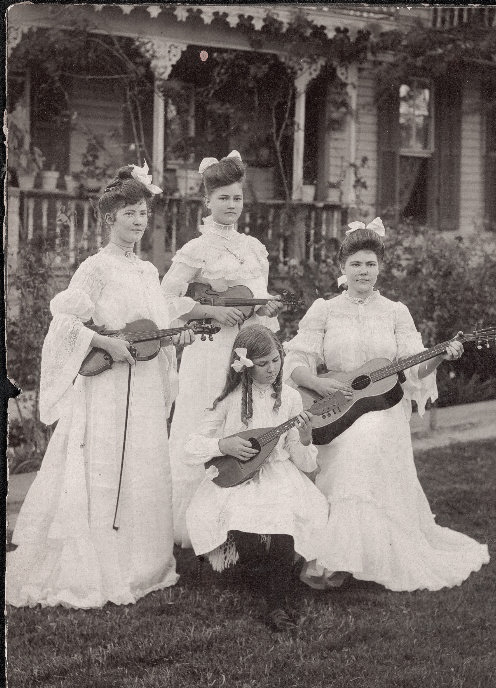 Ellen Hoeffert, my great grandmother (holding guitar) and her sisters, circa 1903 in Schulenburg, Texas. I have many memories of her, she died when I was 13. View full size.
