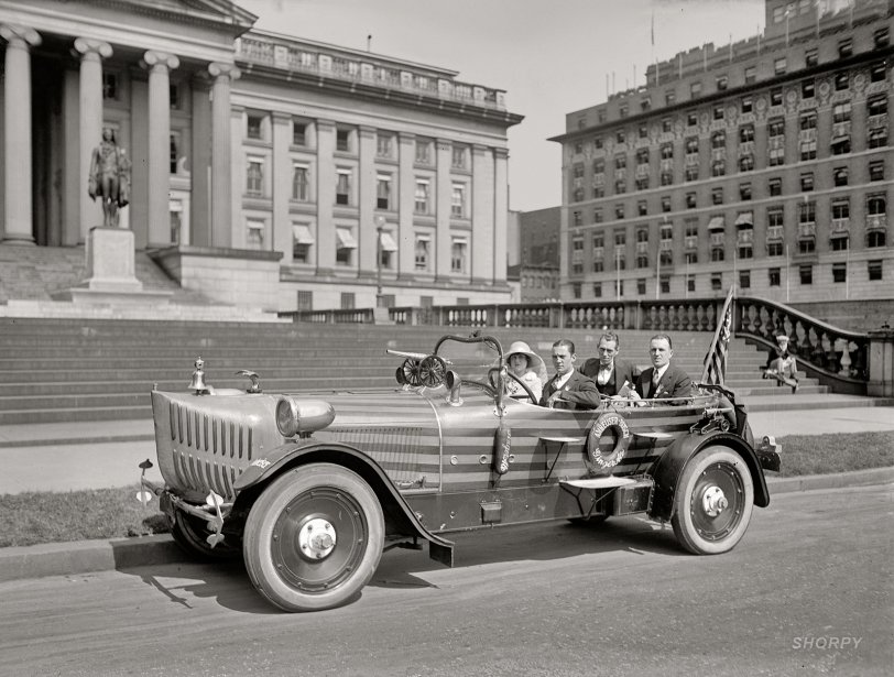 Washington, 1924. "Helen G. Sweeney, Adolph Busch, Joseph Gallegher, Henry Glyn." Helen, who as Miss Washington represented the District of Columbia in the 1924 Miss America pageant, was also Miss Treasury Department that year. She's shown here in front of the Treasury building in a nautical-themed car bearing the insignias of Anheuser-Busch and Budweiser, promoting the company's beverages during the Prohibition years. National Photo glass negative. View full size.
