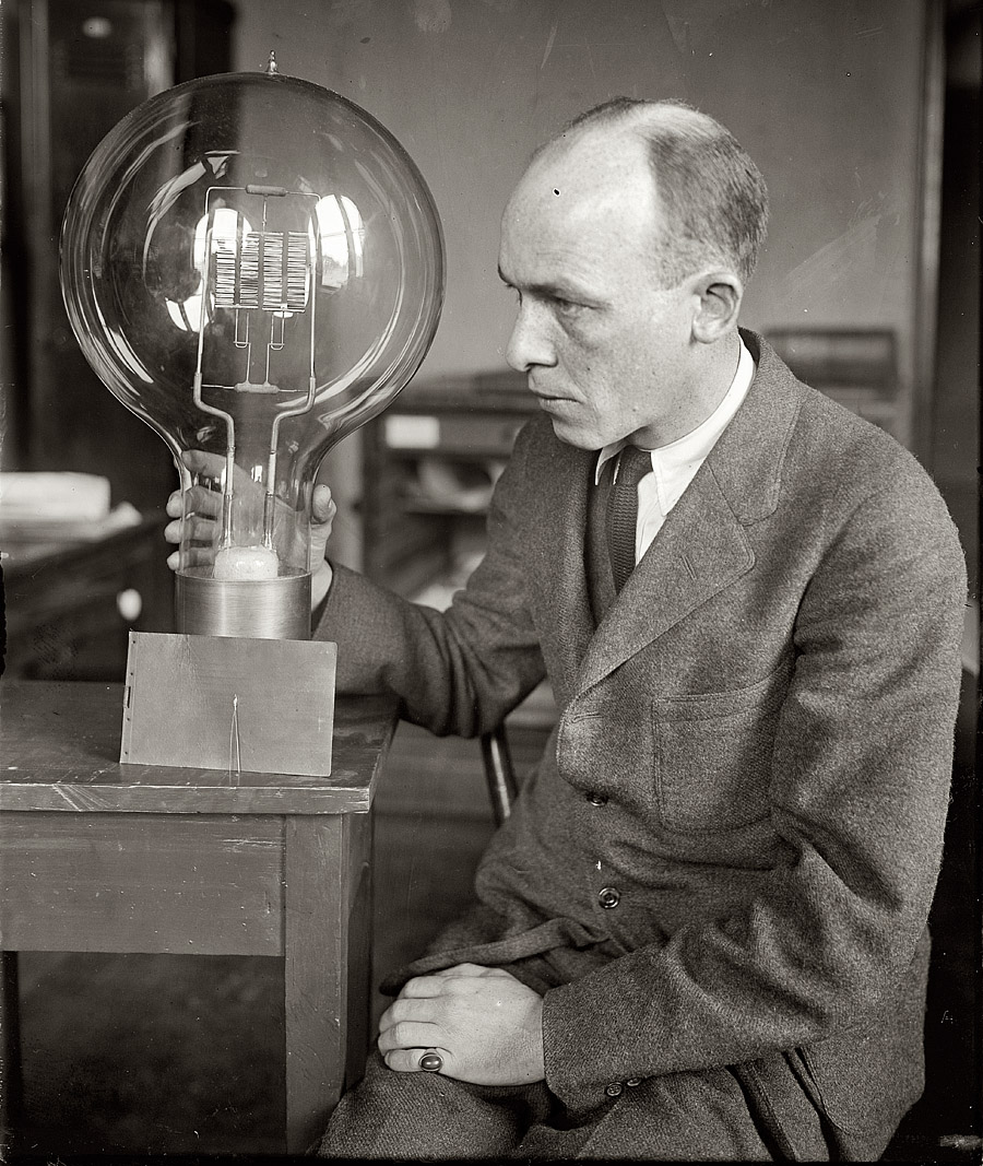 March 12, 1925. "C.W. Mitman of Smithsonian Institution with giant and midget bulbs." View full size. National Photo Company Collection glass negative.