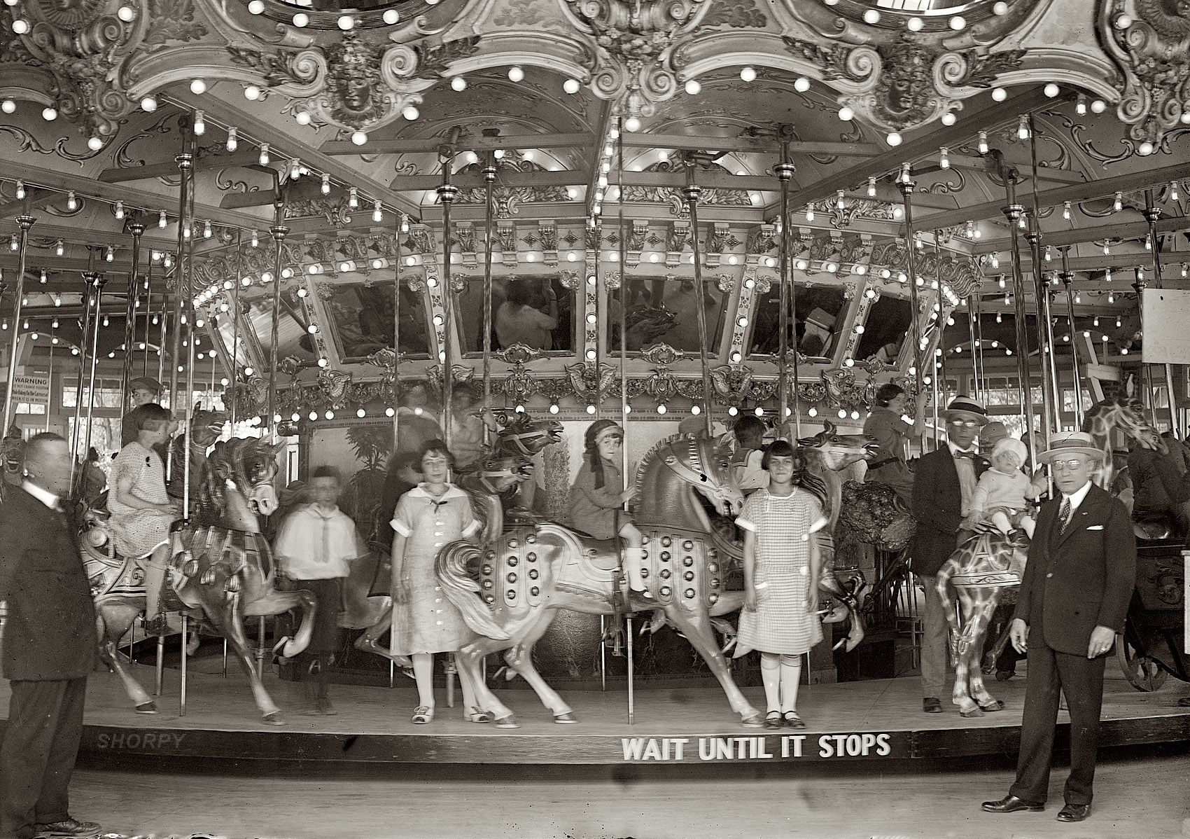 "Glen Echo Park Co., 1925." The Dentzel Carousel at the Glen Echo amusement park in Montgomery County, Maryland. National Photo Company glass negative. View full size.