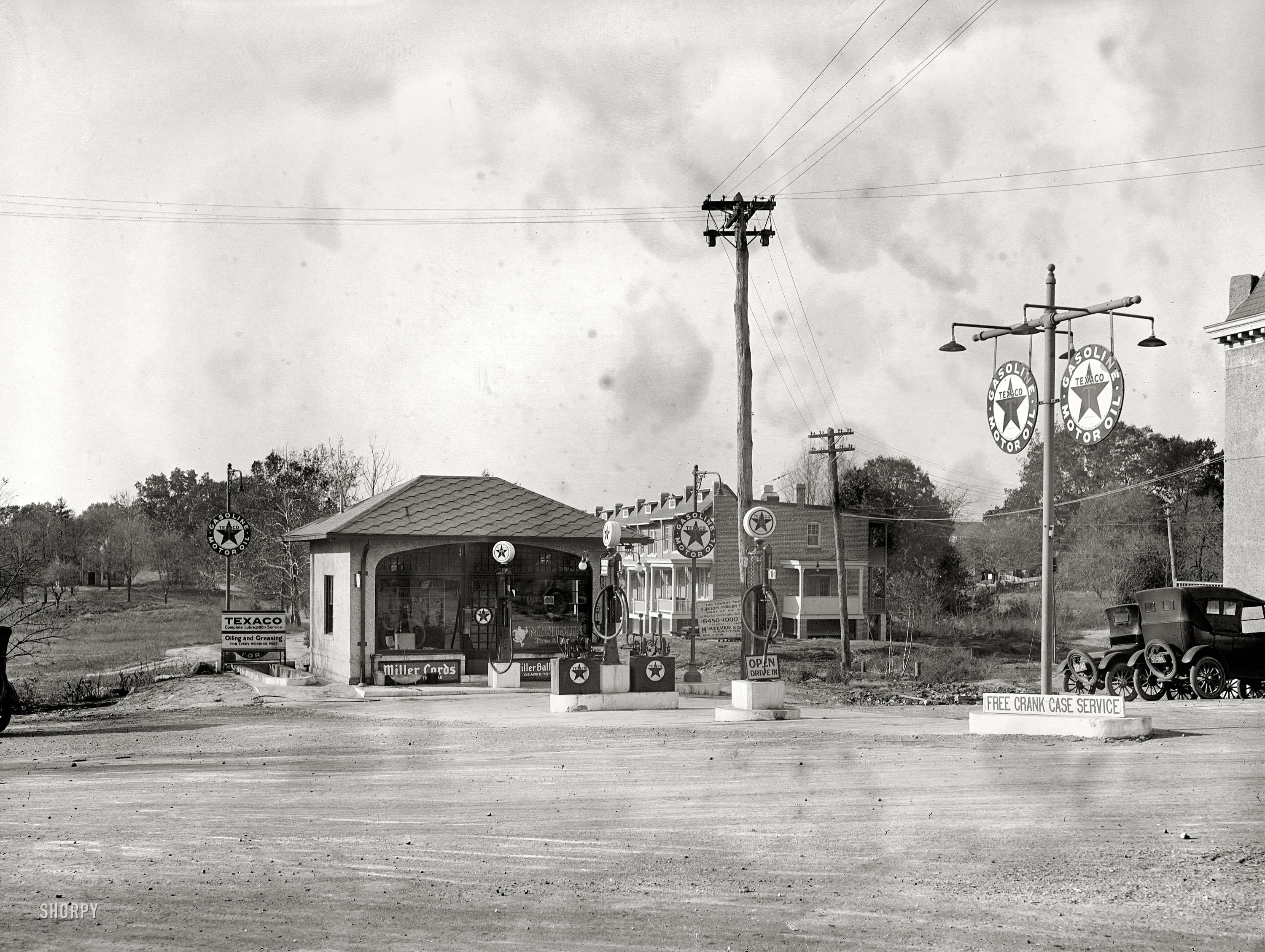 1925. Washington, D.C. "Texas Company, Georgia Avenue and Military Road." Gas now 20 cents a gallon for regular, 23 for Texalene Benzol Blend. As we can see, this was during the Great Splotch Epidemic of 1925. View full size.
