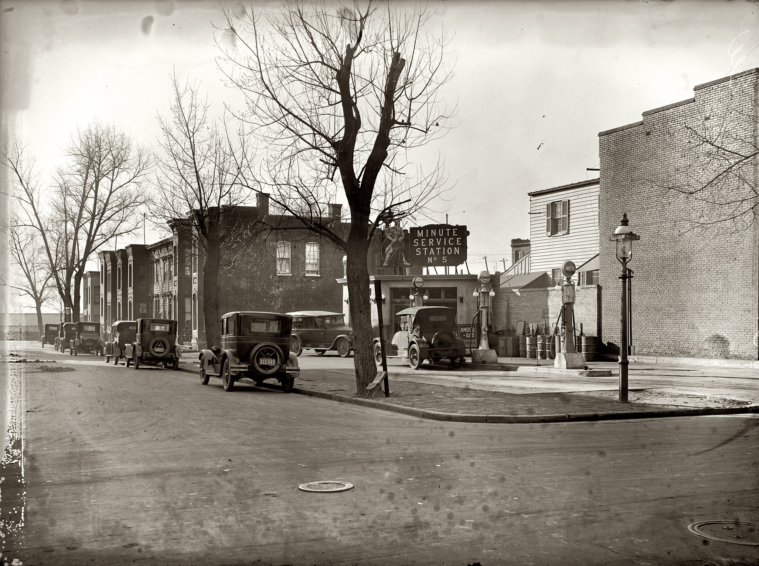 1925. Washington, D.C. "Texas Company. Linworth Place and C Street S.W." National Photo Company Collection glass negative. View full size.