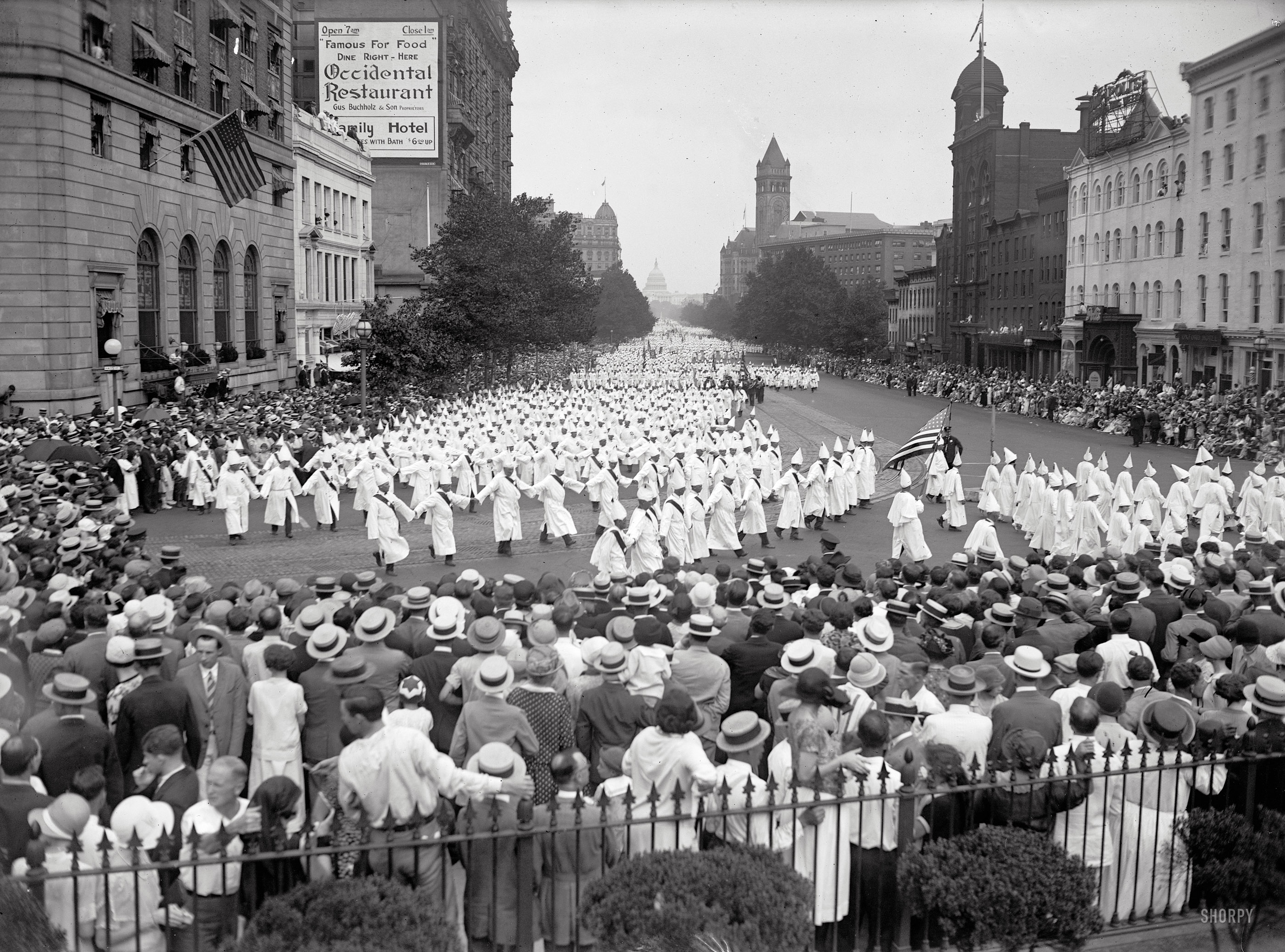"KKK parade on Pennsylvania Avenue, August 8, 1925." From the Washington Post's report: "Phantom-like hosts of the Ku Klux Klan spread their white robe over the nation's most historic thoroughfare yesterday in one of the greatest demonstrations this city has ever known. . . . Police estimated that there were 30,000-35,000 in the weird procession -- men, women and children of the Klan." National Photo Company Collection glass negative. View full size.