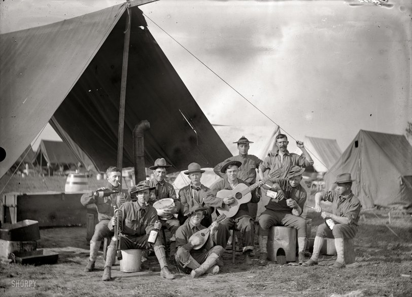 Circa 1914 in the vicinity of Washington, D.C. "U.S. Army soldiers in front of tent." National Photo Company Collection glass negative. View full size.
