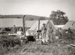 "U.S. Army camp kitchen." Somewhere in the general vicinity of Washington, D.C., circa 1918. National Photo Company glass negative. View full size.