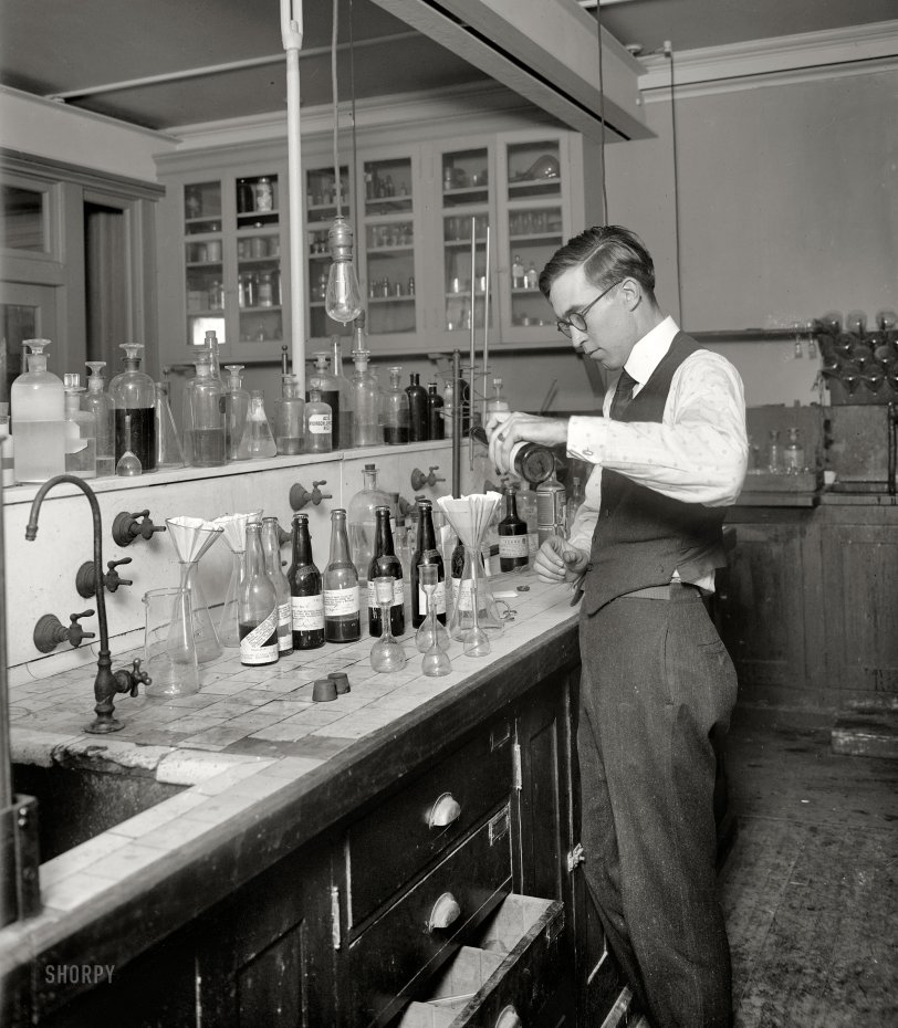 Washington, D.C., circa 1920. "U.S. Treasury, Internal Revenue Department." Measuring the alcohol content of various libations and tonics at the start of Prohibition. National Photo Company Collection glass negative. View full size.
