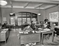 Washington, D.C., January 1920. "Selznick Pictures." Interior view of the booking and exhibitor relations office seen here. Where the tidy desk belies an overflowing waste basket. National Photo glass negative. View full size.