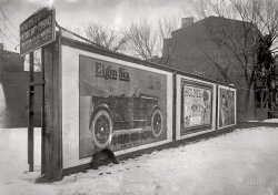 Washington, D.C., circa 1920. "Wamsley billboard." While pondering the postworthiness of this moldy old glass negative, I noticed the small sign appended to the big one: "On this site will be the new home of the Methodist Board of Temperance, Prohibition and Public Morals." And therein lies a tale, having to do with the Chesterfield ad at the far end of the billboard. Which seems to have caused some embarrassment for the temperance board, who owned this property and was profiting from the advertisement for the "weed," despite tobacco being one of the vices it aimed to stamp out. After all that research I still don't know who Wamsley was. National Photo Company glass negative. View full size.
The Methodist BuildingThe Methodist Building, 100 Maryland Avenue NE
This prominent Capitol Hill location, across the street from the Supreme Court, was built by the Methodist Board of Temperance, Prohibition and Public Morals in 1923. The message was clear: the Methodists wanted to remind Congress and the courts that Prohibition was the law of the land. The board disbanded in the 1950s, and the building is now home to the United Methodist General Board of Church and Society.
http://www.prohibitionhangover.com/temptour.html
Board of Temperance, Prohibition and Public MoralsI bet they threw quite a housewarming party when the building went up. Ice water, sheet cake and who knows what else.
Friends of the &quot;Weed&quot;This corner, First and Maryland N.E., is still occupied by the Methodist Church.  It's a funny little triangular block on Capitol Hill which survives as private property despite the expansion/encroachment of Federal buildings (Library of Congress, Supreme Court, Congressional office buildings.)



Washington Post, Feb 22, 1920 


Cigarette Poster on Methodest Sign
But Board of Temperance and Morals Will Not Break Contract.

The board of temperance, morals, and prohibition of the Methodist Episcopal Church has not placed its stamp of approval on tobacco in any form, and yet a sign board bearing the advertisement of a popular brand of cigarette graces the lot owned by the board at First street and Maryland avenue northeast.  The company having this posting privilege, it is said, pays the board an annual rental for it.  And all of this leads friends of the "weed" to charge that in a roundabout way these enemies of cigarettes are receiving and income from an advertisement of them.
In explaining what must be an embarrassing position for the board, the Rev. Clarence True Wilson, general secretary, said that when the board purchased the property, which is just opposite the Capitol grounds, it also took over  a contract for the former property owner which already was in force with the billboard people.  This was necessary, he said, in order to obtain the property, which is to be the site of the board's headquarters.  However the contract expires soon and Dr. Wilson declared that the cigarette advertisement would then come down.
Despite the fact that the board has disclaimed any intention of asking for a constitutional amendment prohibiting tobacco, before-mentioned friends of the "weed" are positive that the board is carrying on a campaign of nation-wide propaganda against the "nicotine evil."
View Larger Map
Seen it beforeWhile I was growing up, we had a lot of Mormon farmers in our area who had strict rules about no smoking.  Funny thing was they also grew tobacco.
The Quality Goes In Before the Fender Goes OnThose crafty folks from Elgin left a sample fender with their advertisement, so you can examine the quality construction firsthand. Across town at the future site of the American Distillers Association, you'll find a similar billboard with accessory steering wheel and headlamp.
Behind this billboardis a motorcycle cop. None of that fancy radar for those guys.
(The Gallery, Cars, Trucks, Buses, D.C., Natl Photo)