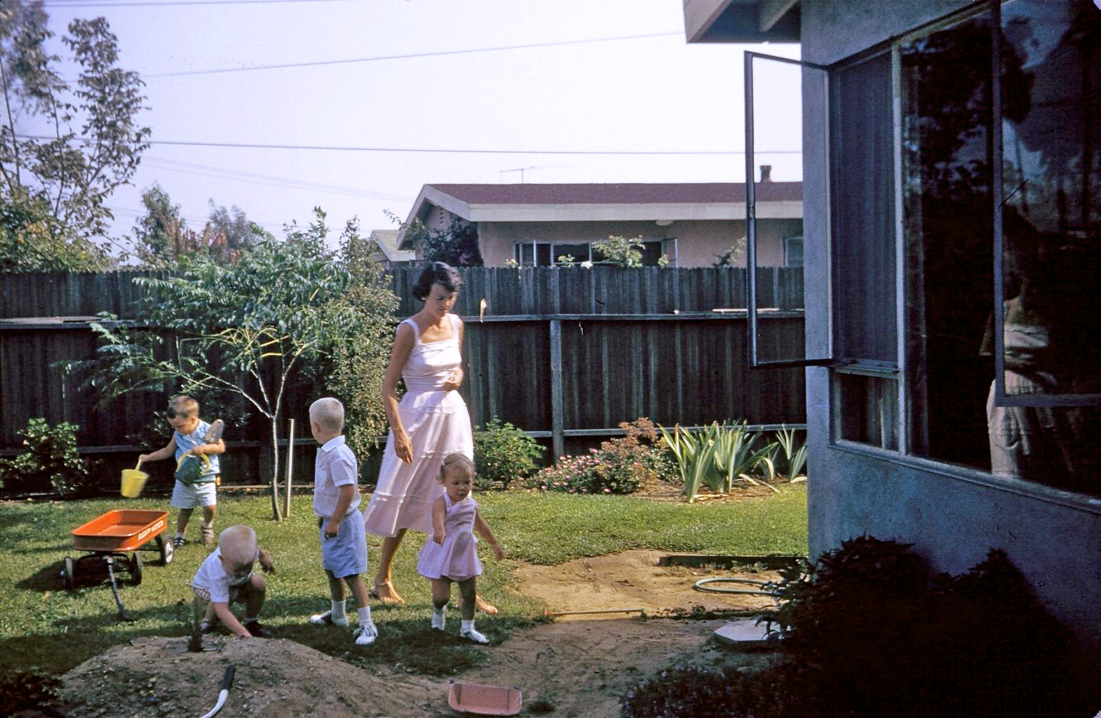 When was the last time you attended a kid's birthday party with ladies in white dresses and the kids were dressed in their best not-suitable-for-dirt clothes? This was 1958, West Covina California. This was my birthday party, dammit! View full size.