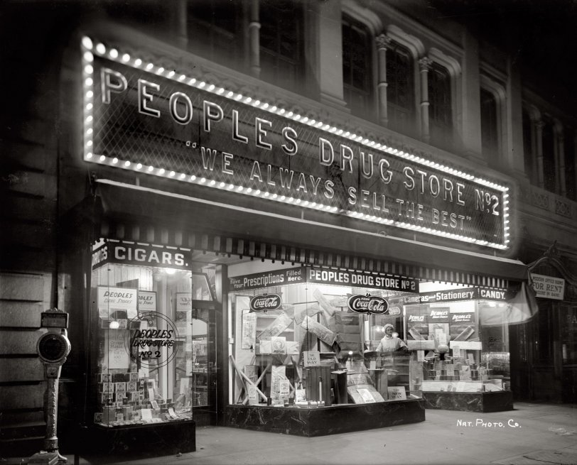 "People's Drug Store No. 2, Seventh and E Street, Night." 1919 or 1920 in Washington, D.C. National Photo Company glass negative. View full size.
