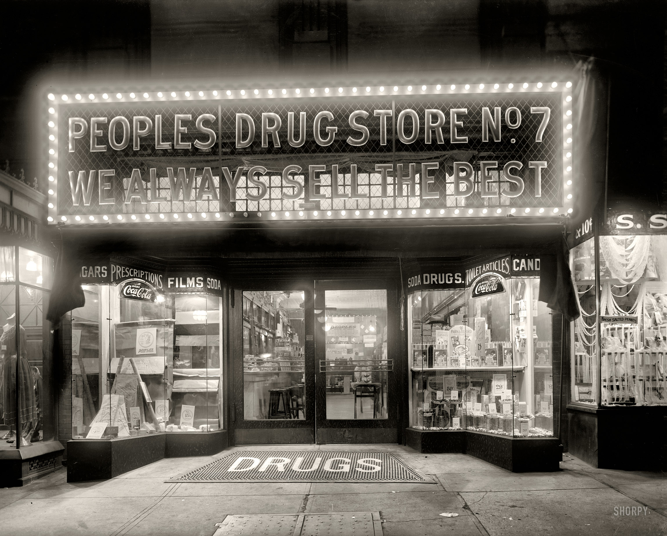 Washington, D.C., circa 1920. "People's Drug Store, 11th & G streets, night." National Photo Company Collection glass negative. View full size.