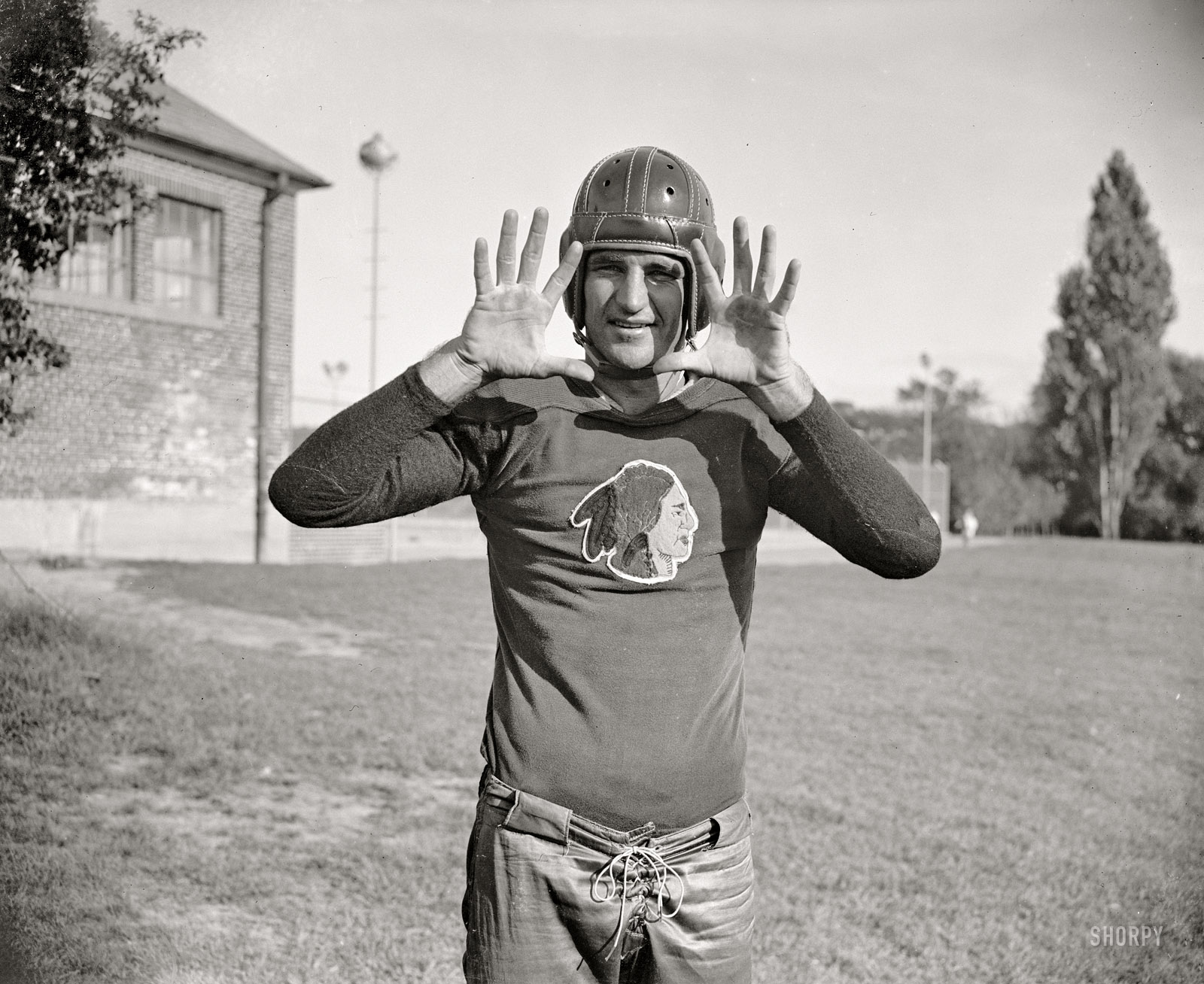September 11, 1937. "'Slinging Sammy' Baugh, new addition to the Washington Redskins. The Texas Christian U. star is rated as one of the greatest of this generation as far as the passing game goes. Sammy's most recent feat was the practical winning alone of the Green Bay all-stars game at Chicago with a series of sensational passes. He is 24 years old, weighs 190, is six feet tall. Followers of professional football will hear a lot from Sammy this fall." View full size.
