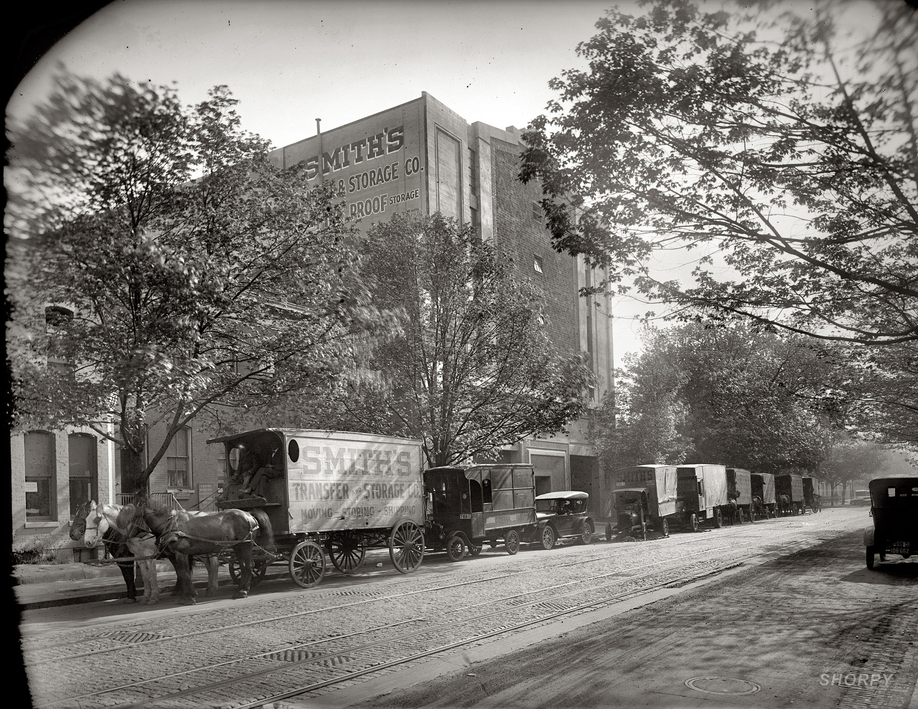 Washington, 1920. "Smith Storage Co., 13th & U Streets N.W." With the motor truck gaining fast on the horse team. National Photo Company. View full size.