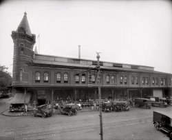 Washington, D.C., 1921. "Center Market, 9th Street wing." Bananas, dancing and roller skating. National Photo Co. Collection glass negative. View full size.
Engel&#039;s Autocar

Have Used Autocar for Six Years
C. Engel's Sons, wholesale provisions, Center Market, Washington, say about Autocar: "Best car ever made. We have three of them and they are absolutely O.K. We bought our first six years ago."



The Copywriter&#039;s ArtSomewhat underdeveloped here, ain't it? "Absolutely O.K." is not the kind of hyperbole you'd find in a car (or truck) ad today.
The National ArchivesIn this location today. Center Market had room for 700 vendors inside in 1900. Was built in 1871 according to The National Museum of American History. Would love to see pictures inside of vendors and later skating rink and dance floor.
[More photos here. - Dave]

(The Gallery, Cars, Trucks, Buses, D.C., Natl Photo, Stores & Markets)