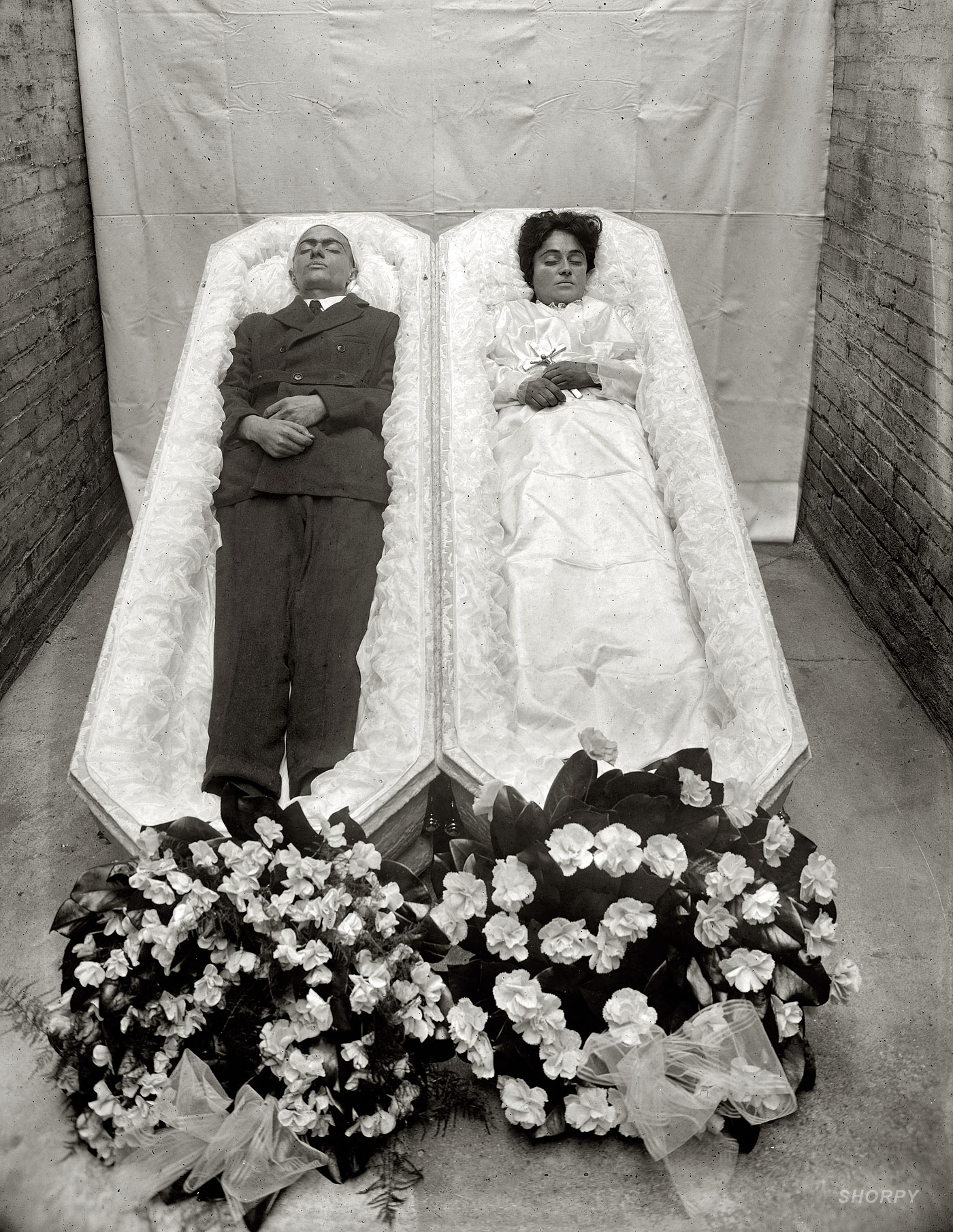 "Greek murder." July 1920. Two victims of a bloody altercation involving a hatchet and revolver that left three people dead in a rooming house at 809 Ninth Street in Washington. National Photo Company glass negative. View full size.