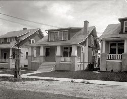 "Washington Times. 6929 Ninth Street," circa 1920. View full size. National Photo Company Collection glass negative. Fast-forward to 6929 today.
6929 TodayClick the image to zoom.

TreeNice to see that tree planted on the right of the sidewalk going to the porch is still there.
The Current MarketCurrent values.
Ninth Street TreesI don't think those are anywhere close to being 88 year old trees along Ninth Street today. 
Fortified SaplingThey weren't taking any chances with that young tree, were they?
Nothing new under the sunI swear that looks like the house that just went up around the corner. Personally I like a bit more yard.
The Alley Out BackBut look at the size of the back yards (see first comment)! I like that design so much, with the alley running behind houses.
6929 TodayView Larger Map
Tree-mendousI have seen these same stockade-like protective structures in many other photos.  Being in the landscape business, I am quite curious about their function.  I originally thought they were to keep horses from damaging the bark, but this would not likely be an issue in 1920.  Any ideas, anyone?  Dave?
[There were still plenty of nibbling urban horses out there (mostly pulling milk wagons) in the 1920s. - Dave]
SurprisedWas browsing the web for images to use in a project of mine an found this. Thought "That looks like where I live." It almost is! I live at 6930, across the street. How surprising to find this! Always looking for history about my house. This is wonderfully close!
(The Gallery, D.C., Natl Photo)