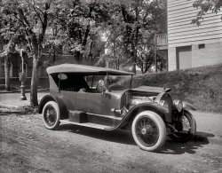 Washington, D.C., circa 1920. "Henno Sales Co." Stutz touring car near a "Fire Alarm Box" lamppost on M Street. National Photo glass negative. View full size.