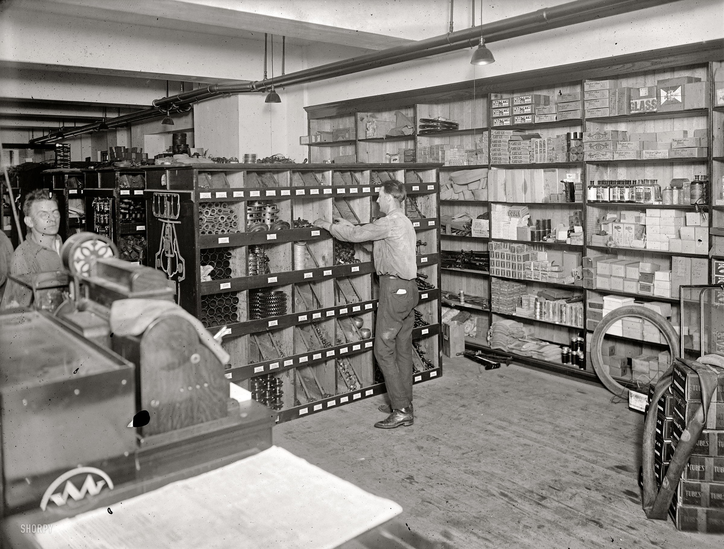 Washington, D.C. August 1920. "Steuart's Garage, stockroom, 12th Street N.E." National Photo Company Collection glass negative. View full size.