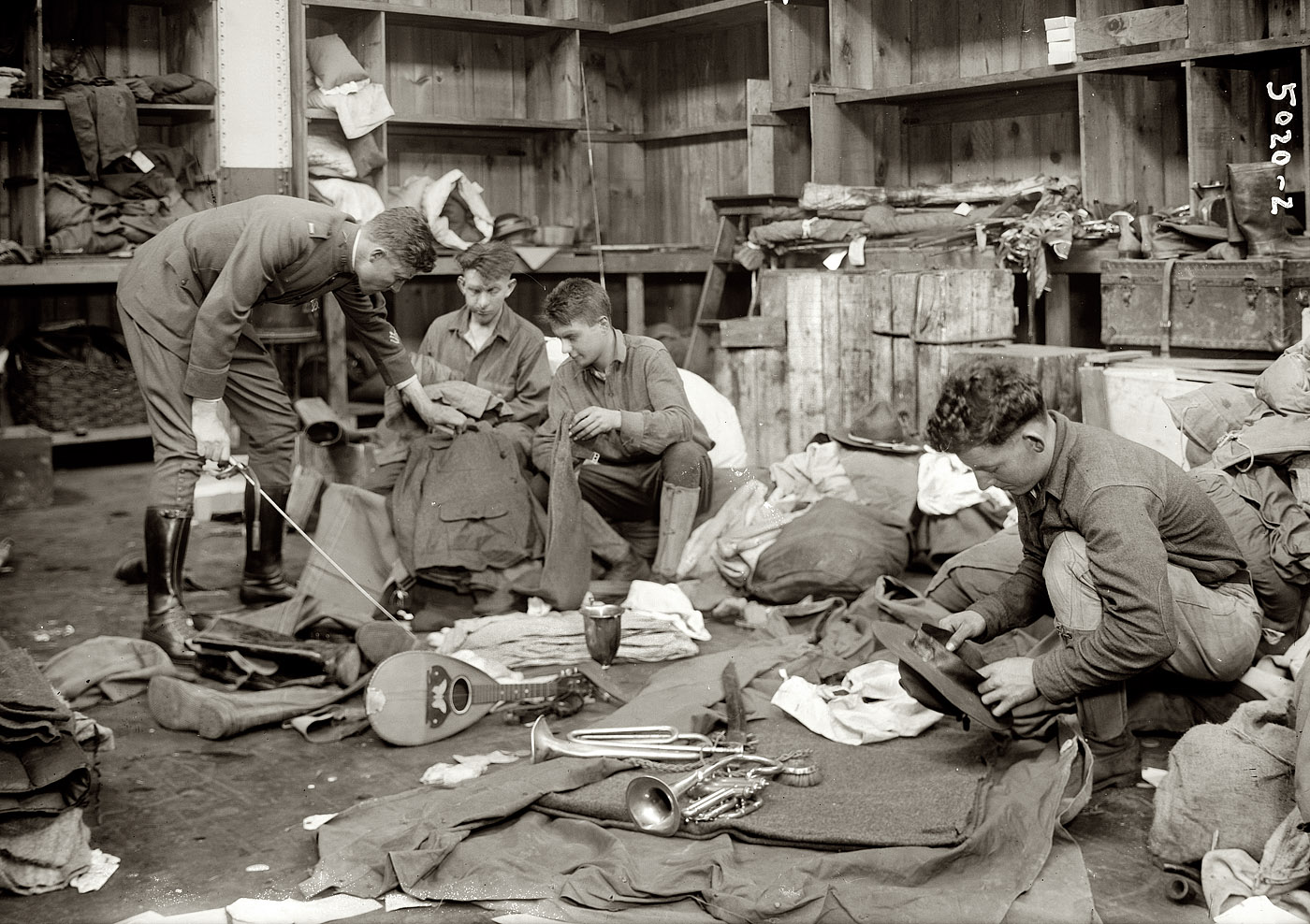 "Tracing lost property of soldiers," circa 1919. View full size. The soldiers seem to be a musical bunch. 5x7 glass negative, George Grantham Bain Collection.