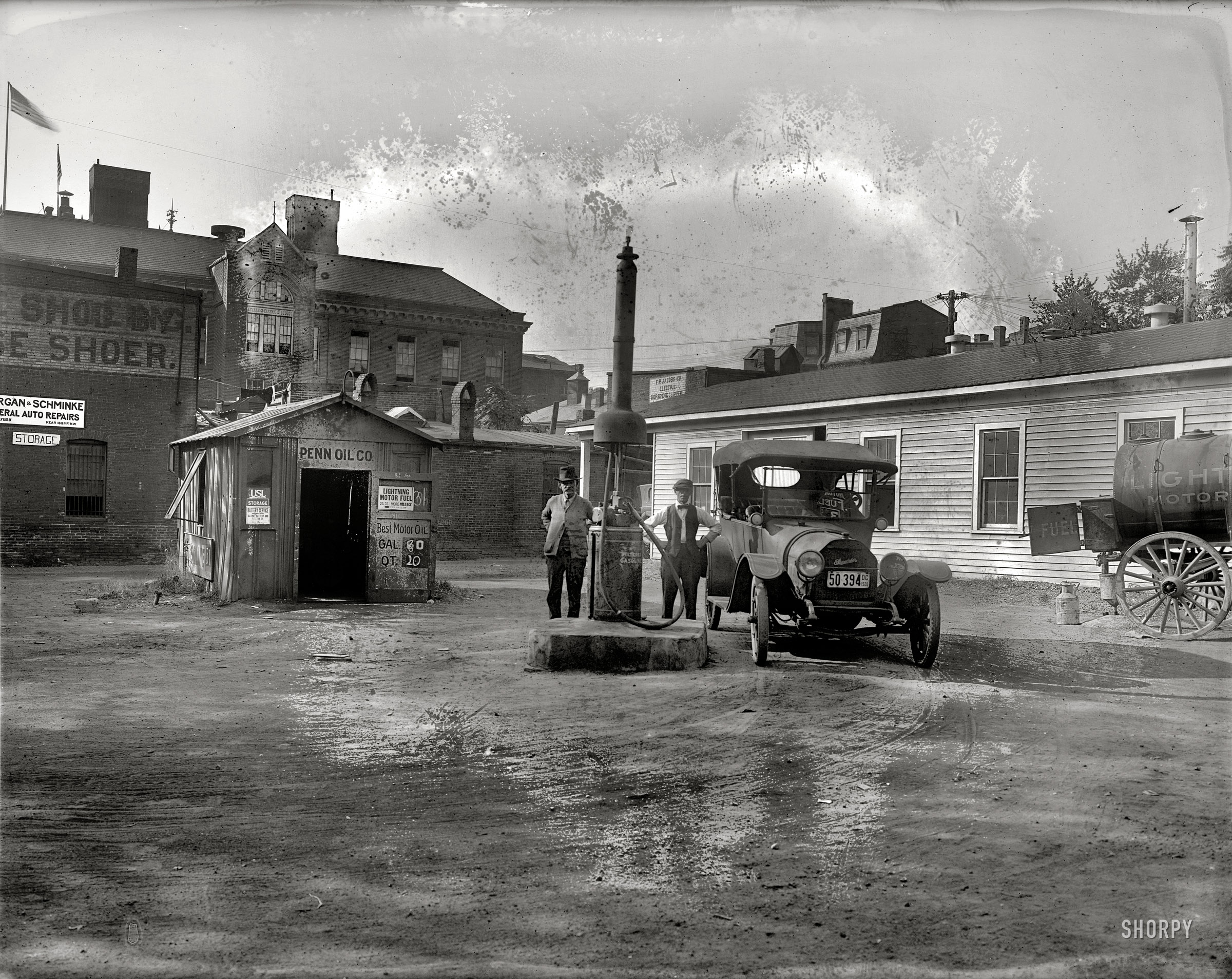 Washington, D.C., in 1920. "Penn Oil Co., 16th and M Sts." Pardon the mold. National Photo Company Collection glass negative. View full size.