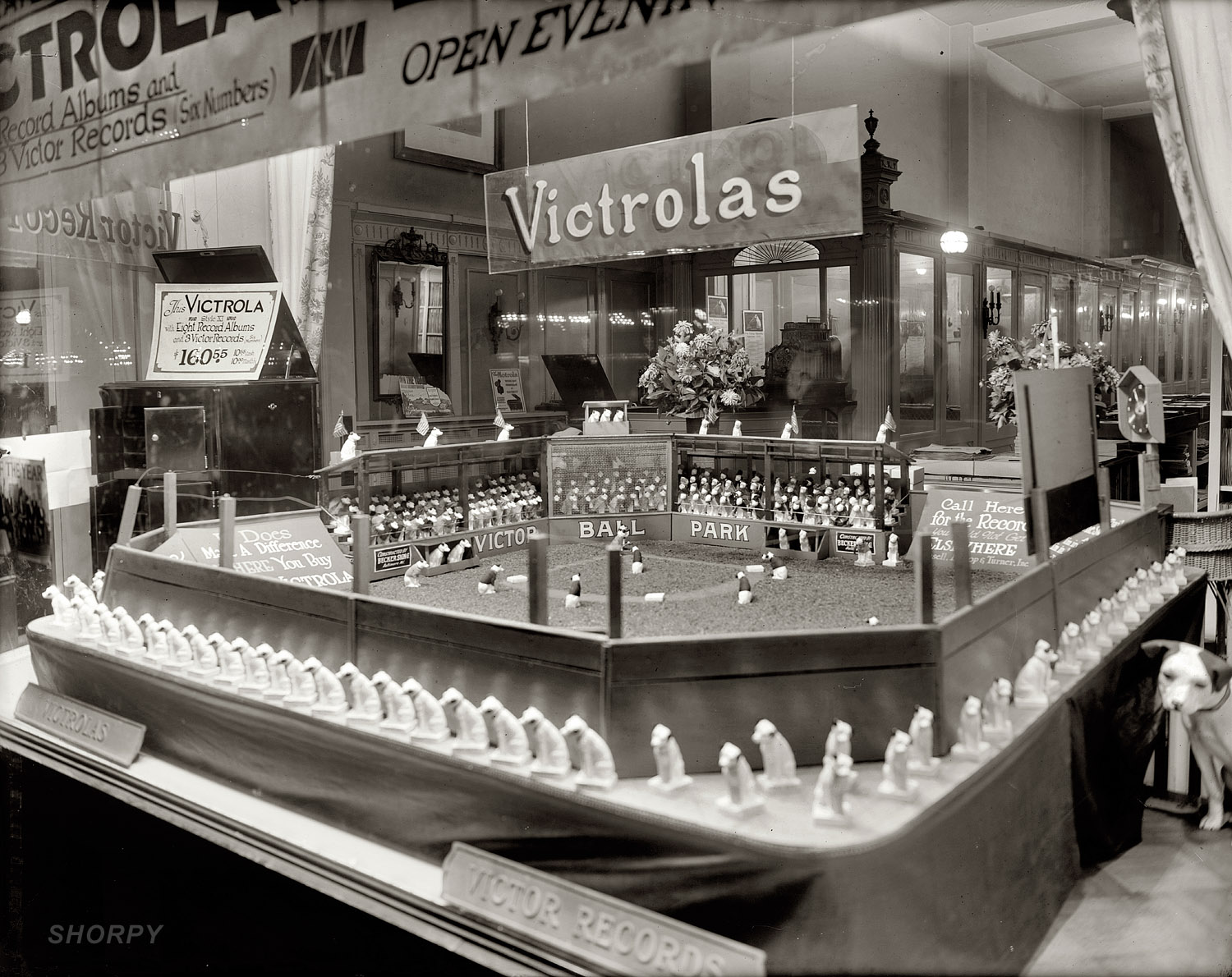 "Ansell, Bishop & Turner window display. 1920." A Victrola dealer in Washington, D.C., puts Nipper in the game. View full size. National Photo Co. glass negative.