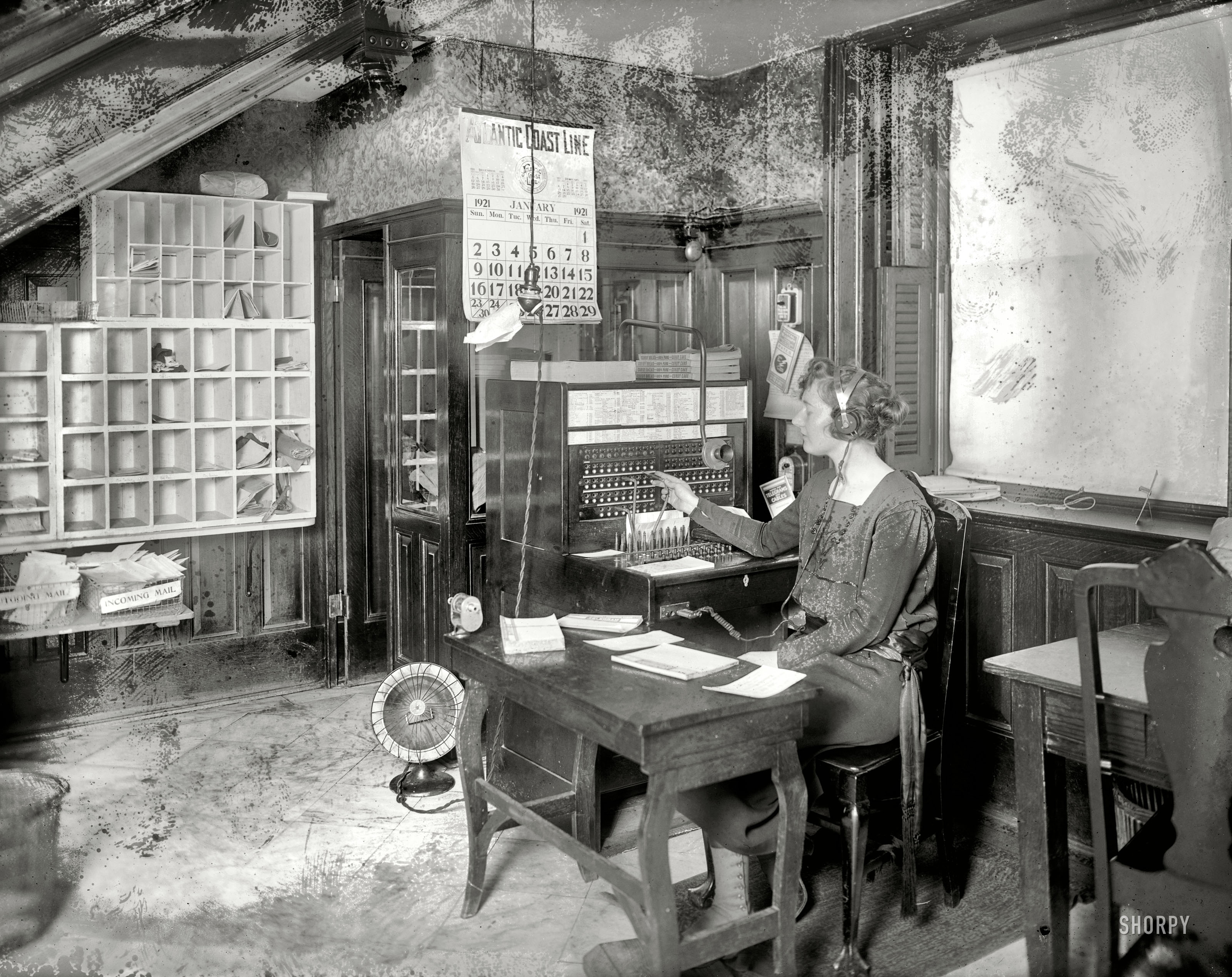 January 1921. Washington, D.C. "National Woman's Party switchboard." If you can ignore the mold and the fingerprints, there are a number of interesting details here. National Photo Company Collection glass negative. View full size.